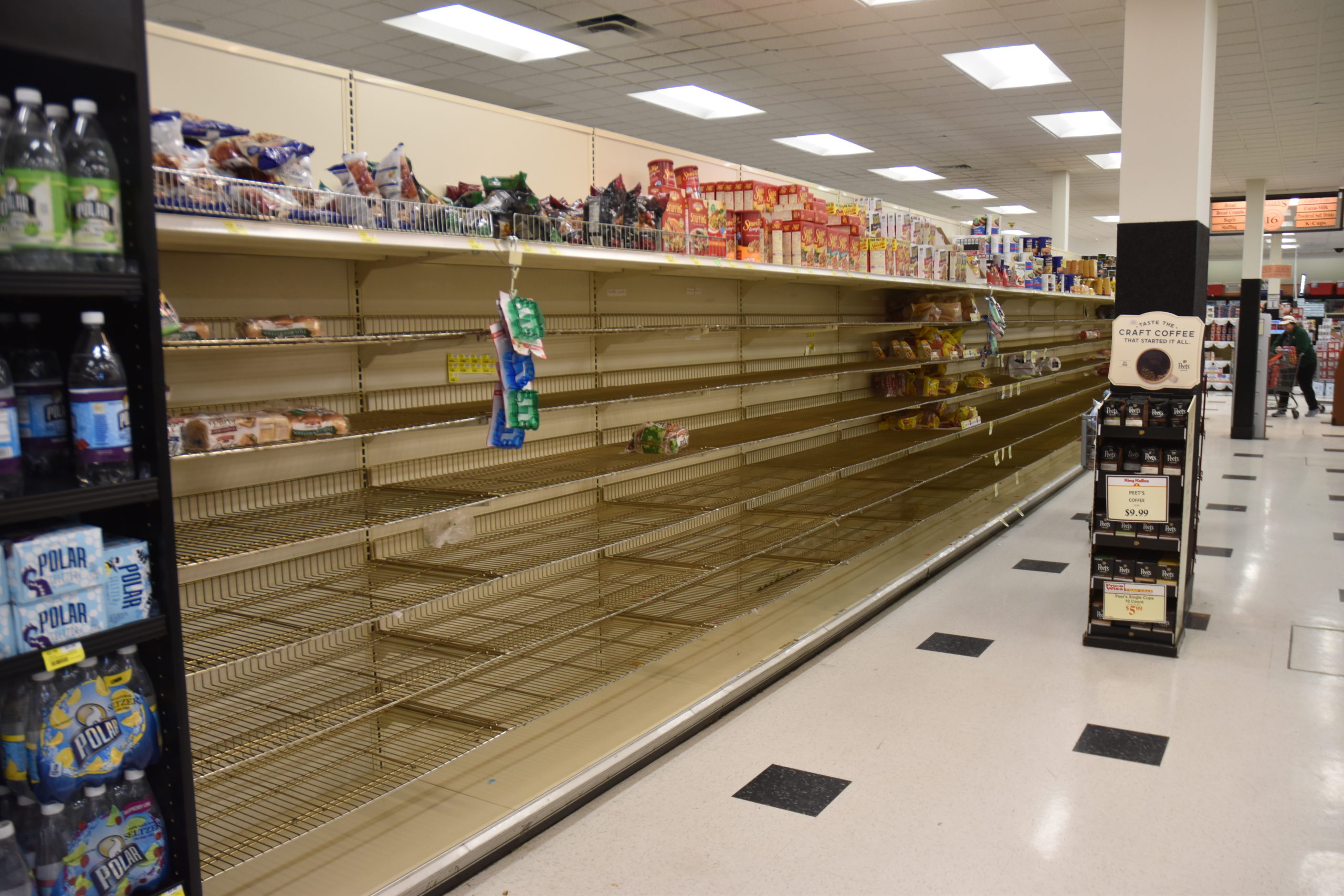 The bread aisle was picked clean at the King Kullen in Bridgehampton on Friday. Although the store was still short of many items on Tuesday, many shelves had been partially restocked.