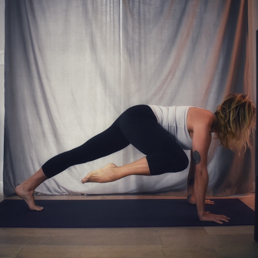 Allison Burke leads an online yoga class.