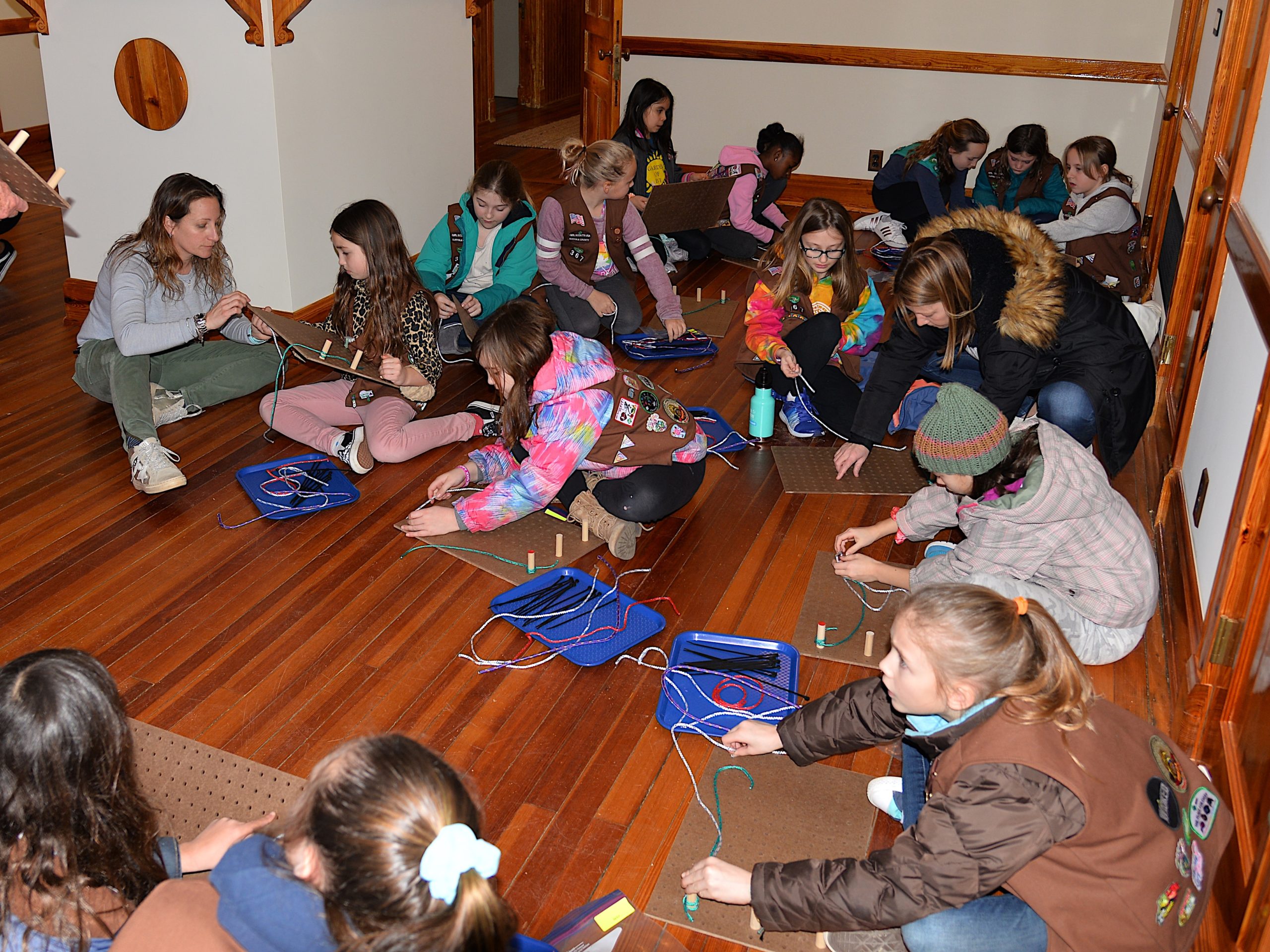 Girl Scouts learned how to tie knots on Friday at the Amagansett Lifesaving Station, with instructors Britton Bistrian and Stewart Close. 