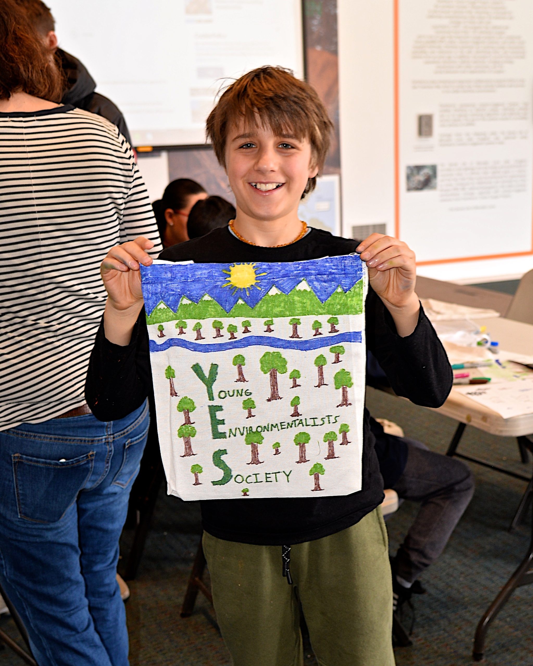 Finny Dianora displays his logo for the new Young Environmentalist Society at the South Fork Natural History Museum in Bridgehampton. KYRIL BROMLEY