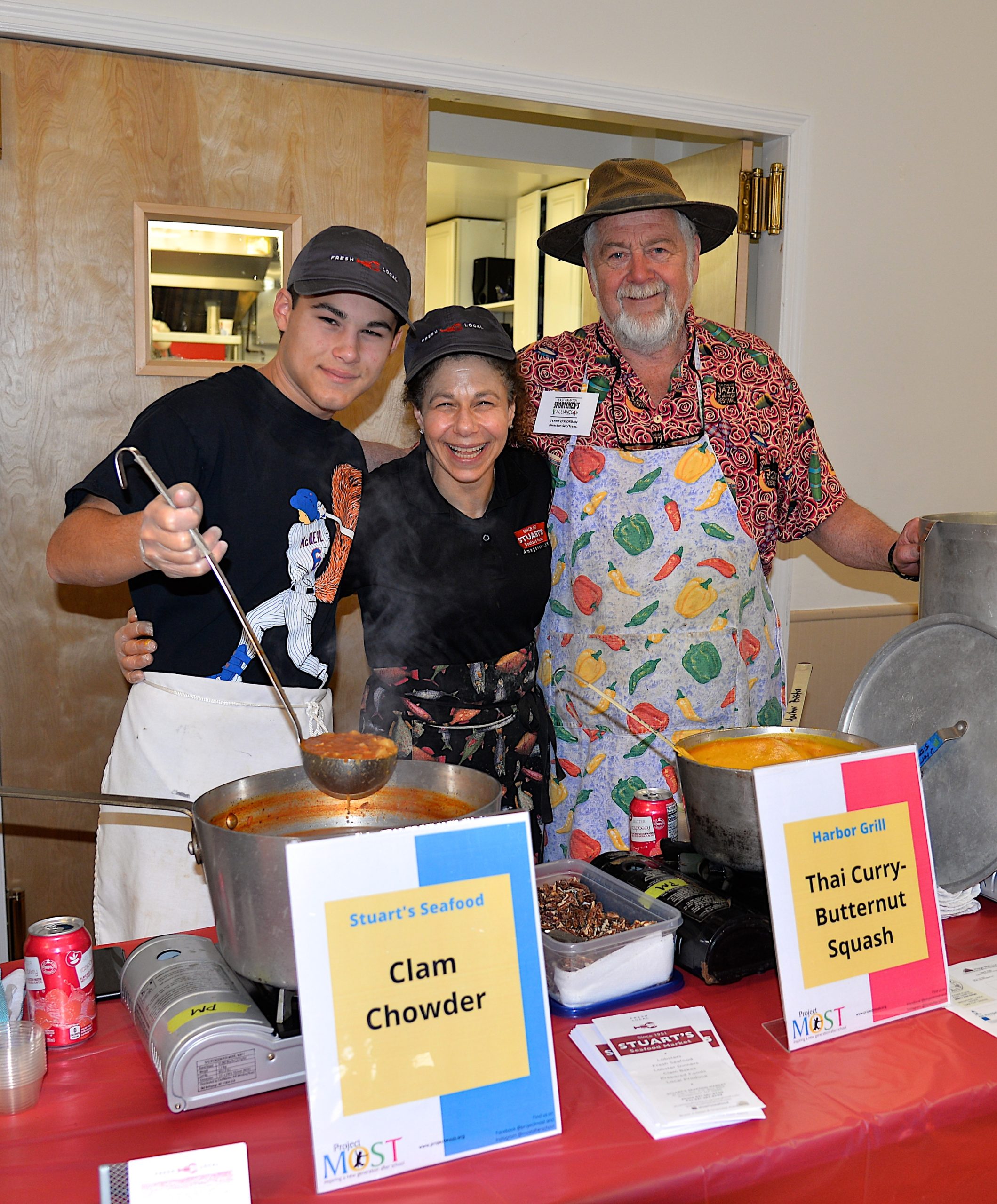 Empty Bowls, a fundraiser for Project Most, with soups from local chefs and restaurants took place at the Amagansett American Legion hall on Sunday. Dante and Charlotte Sasso, and  Terry O’Riordan serving up their soup. KYRIL BROMLEY