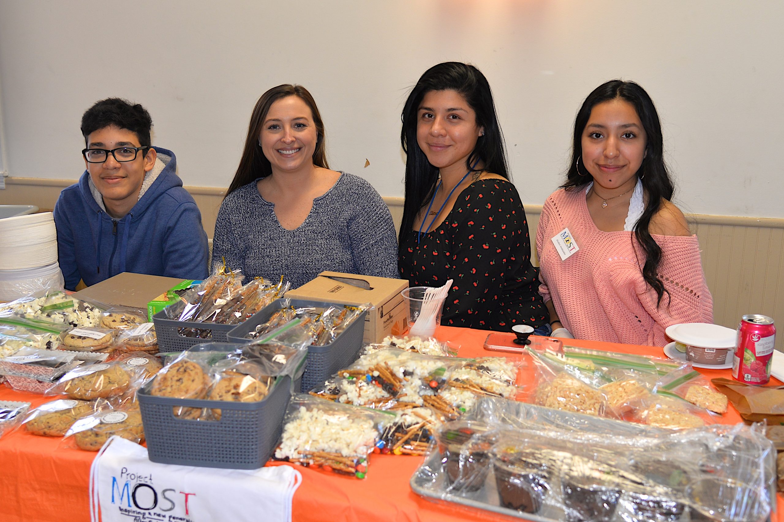 Empty Bowls, a fundraiser for Project Most, with soups from local chefs and restaurants took place at the Amagansett American Legion hall on Sunday. Volunteering at the baked goods table, from left, Aaron Jimenez, Melissa Anderson, Malany Perez and Mariser Gallegos. KYRIL BROMLEY
