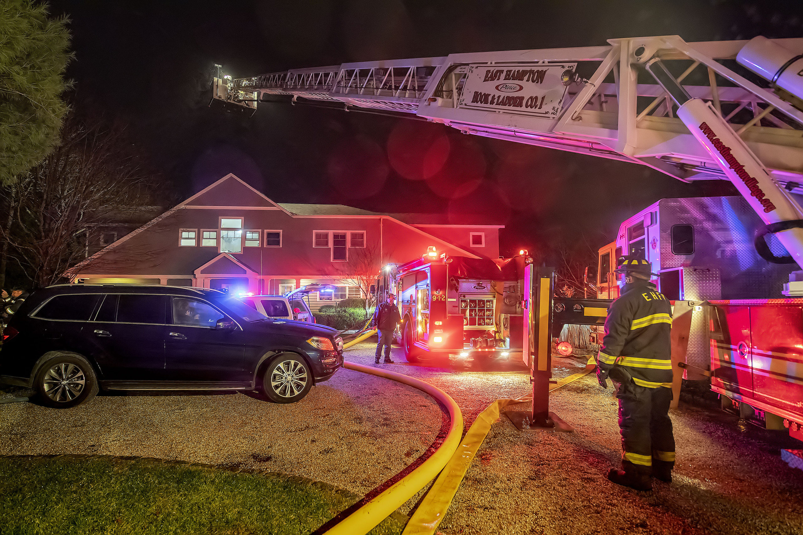 East Hampton firefighters were called to a house fire on Liano Drive in Wainscott Sunday night. MICHAEL HELLER