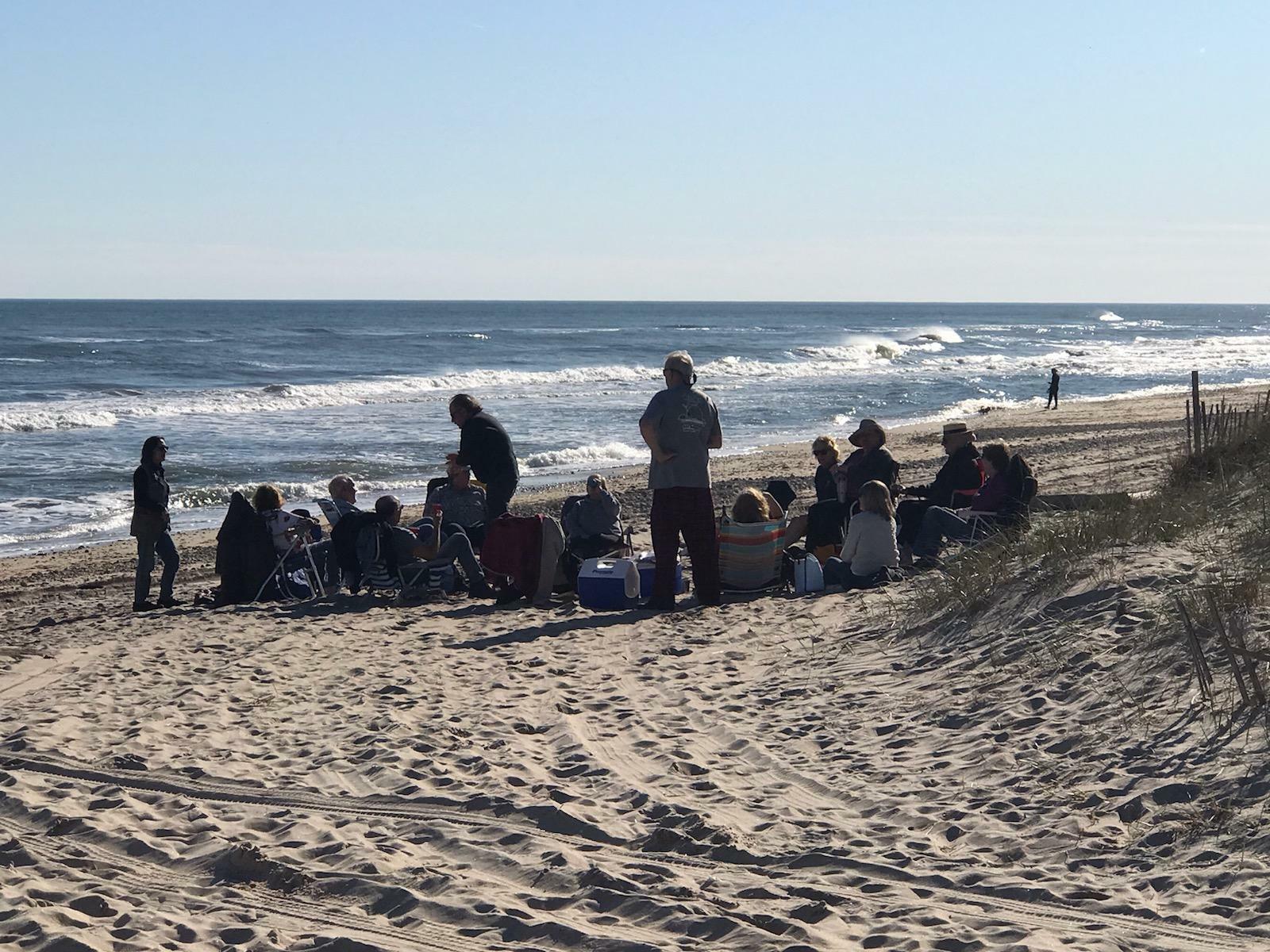 An exasperated East Hampton Town Supervisor Peter Van Scoyoc shared this shot of over a dozen people at a beach party on Ditch Plains Beach in Montauk Friday evening. 