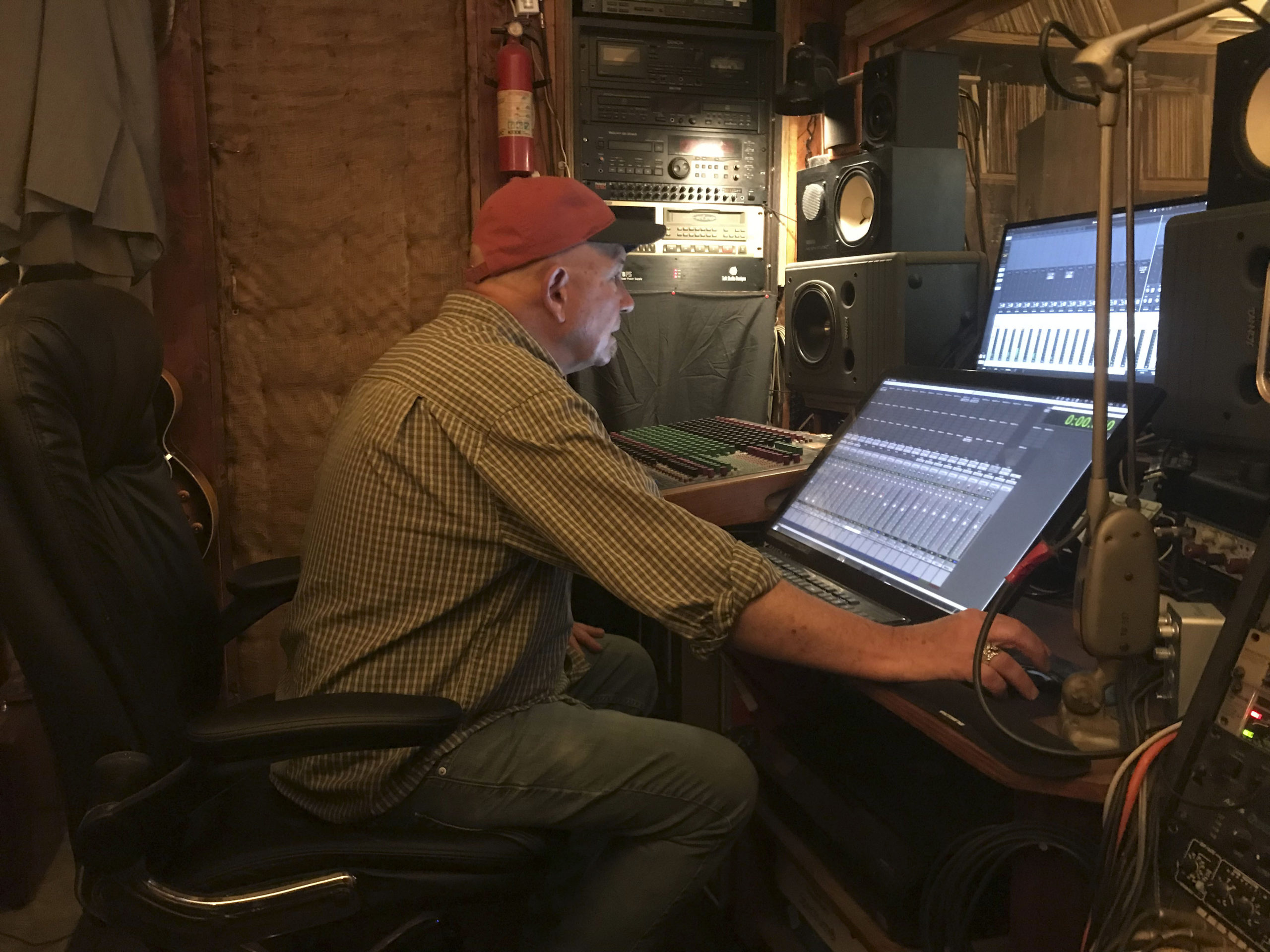 Johnny Blood working on CD sessions in his studio.  COURTESY RANDY PARSONS