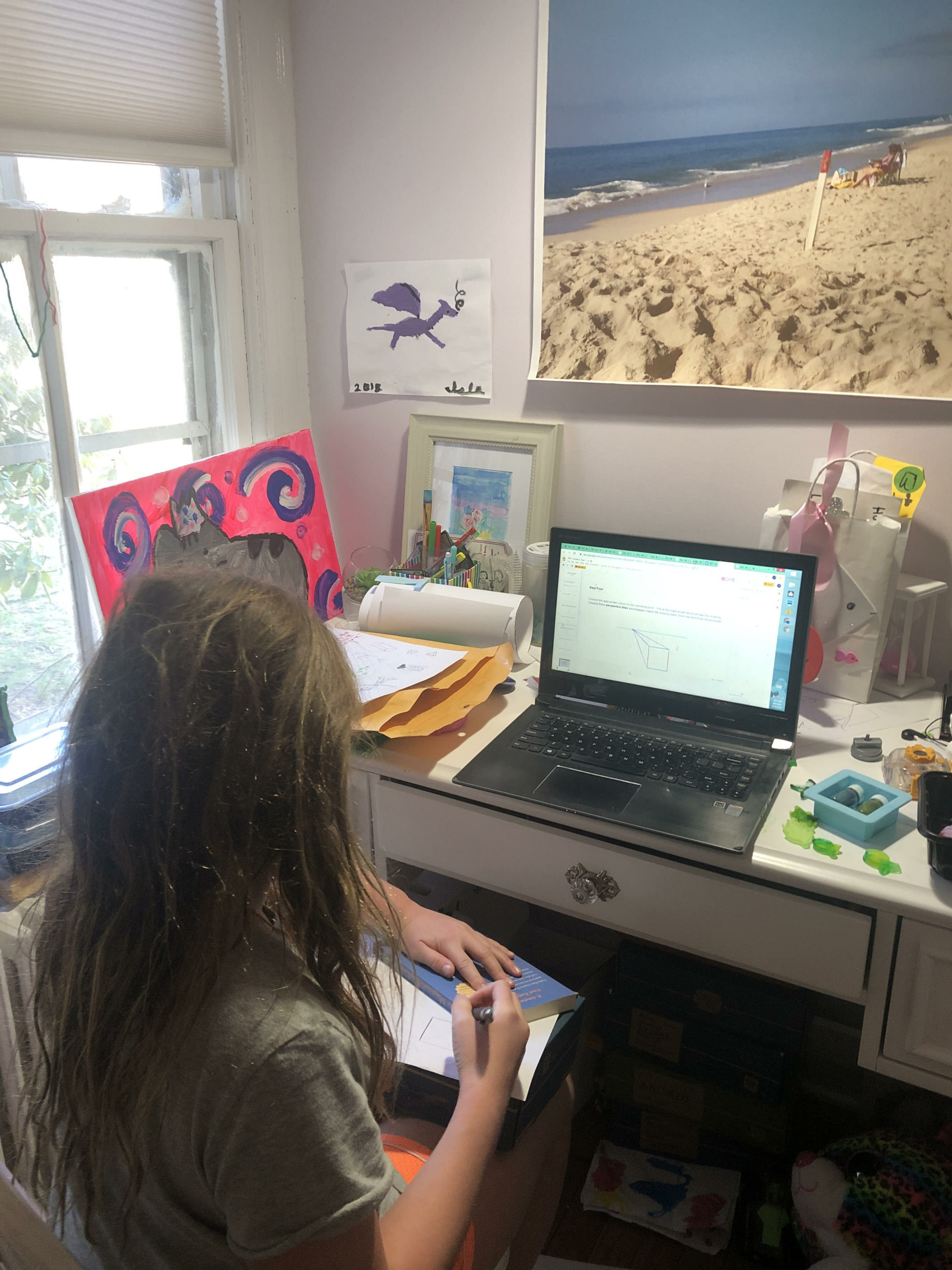 Isla McLean works on the day's lessons remotely. 