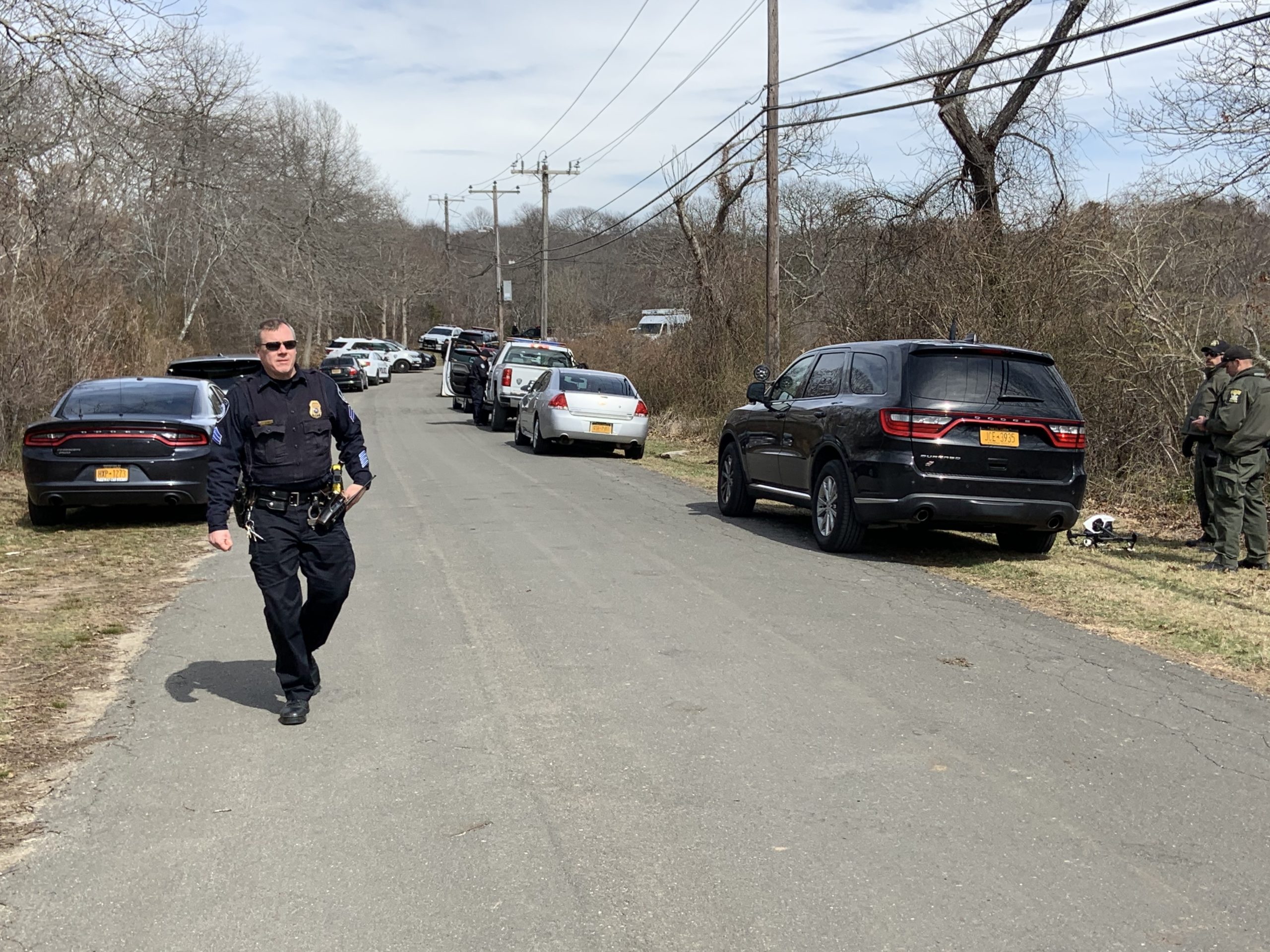 Police search for Peter Beard on Old Montauk Highway.