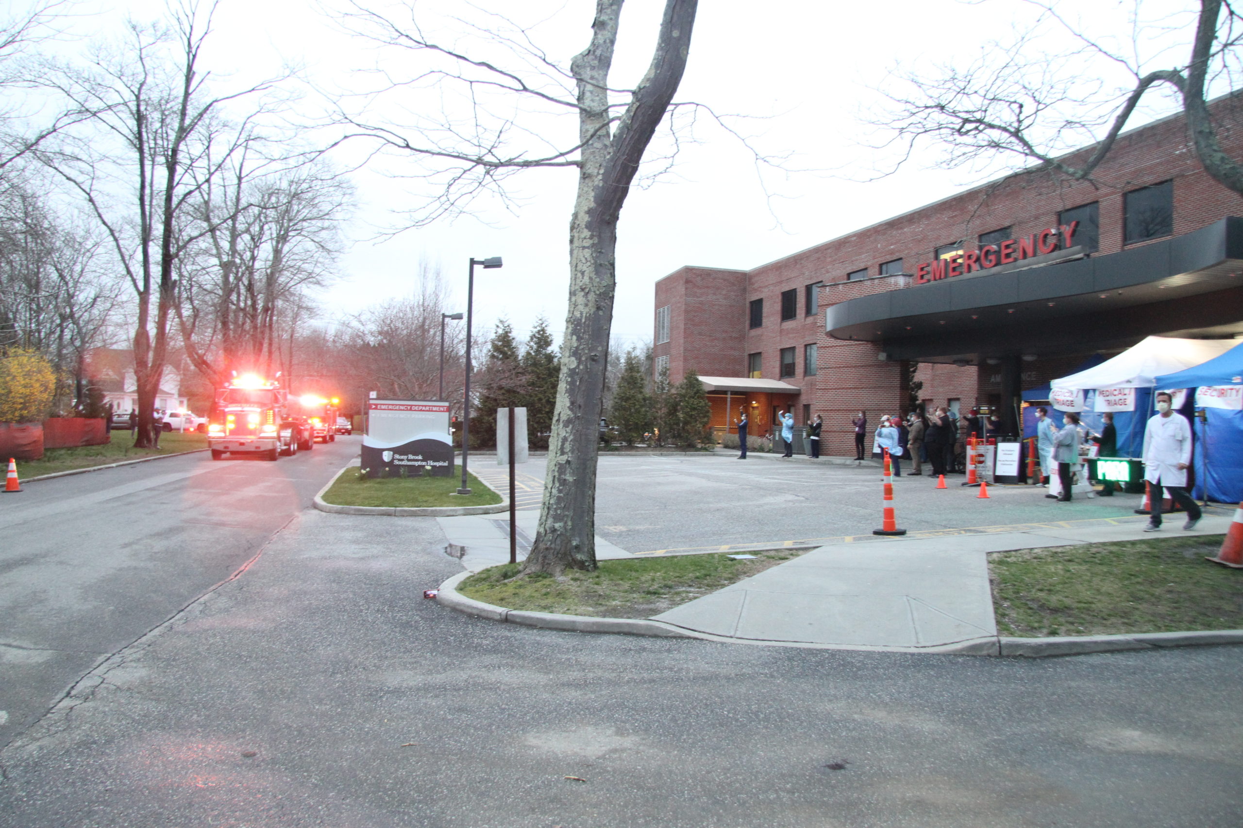 First responders from every department on the South Fork streamed past the Stony Brook Southampton Hospital emergency room on Friday night to salute hospital staff. 