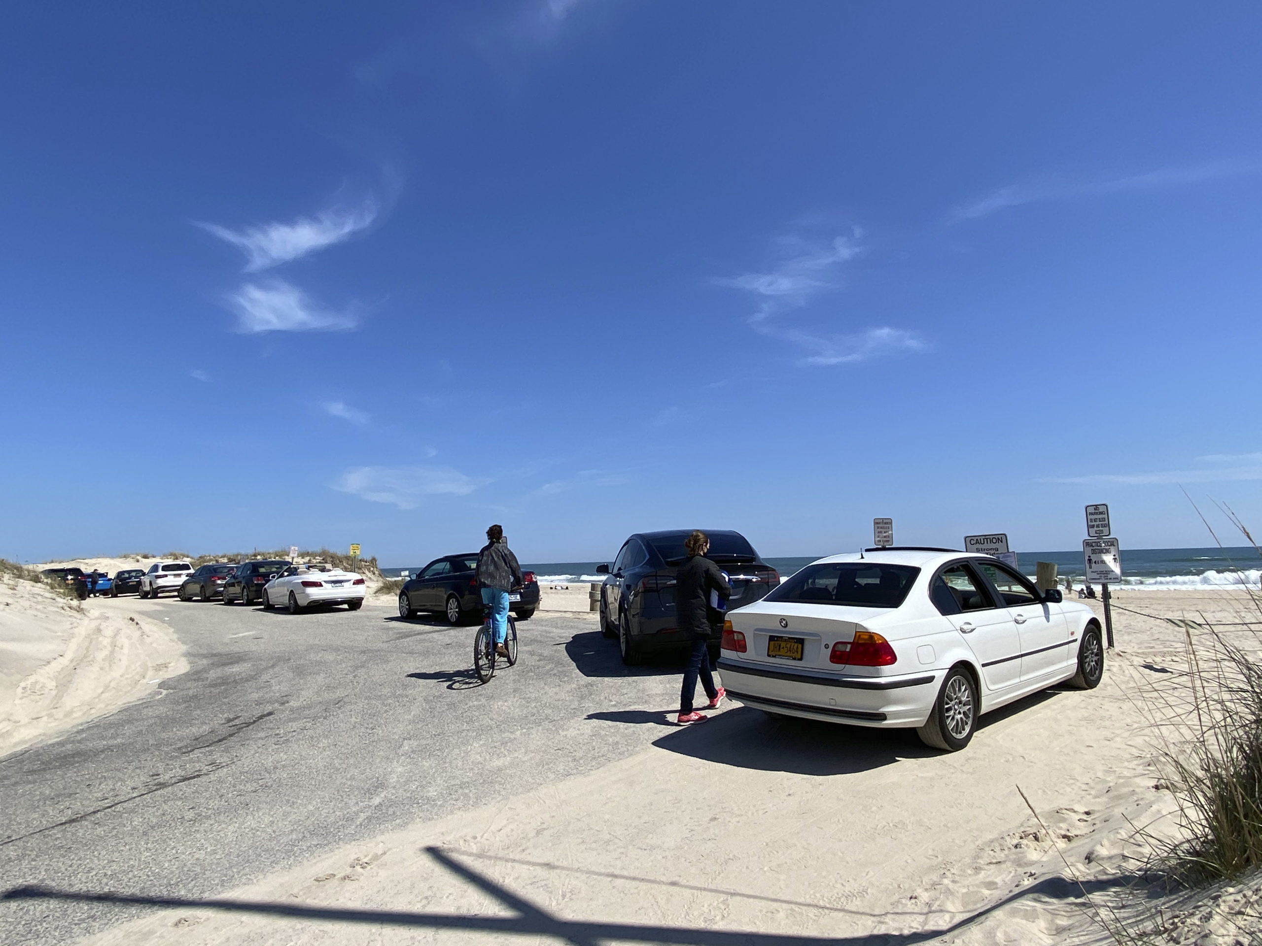 A line of cars at Cooper's Beach in Southampton Village on Saturday.  DANA SHAW