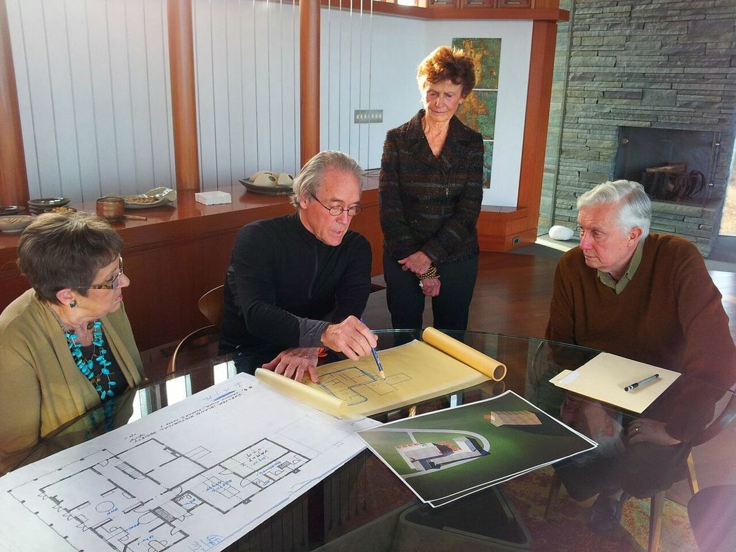 William Pederson reviews plans with members of the Shelter Island Historical Society. 