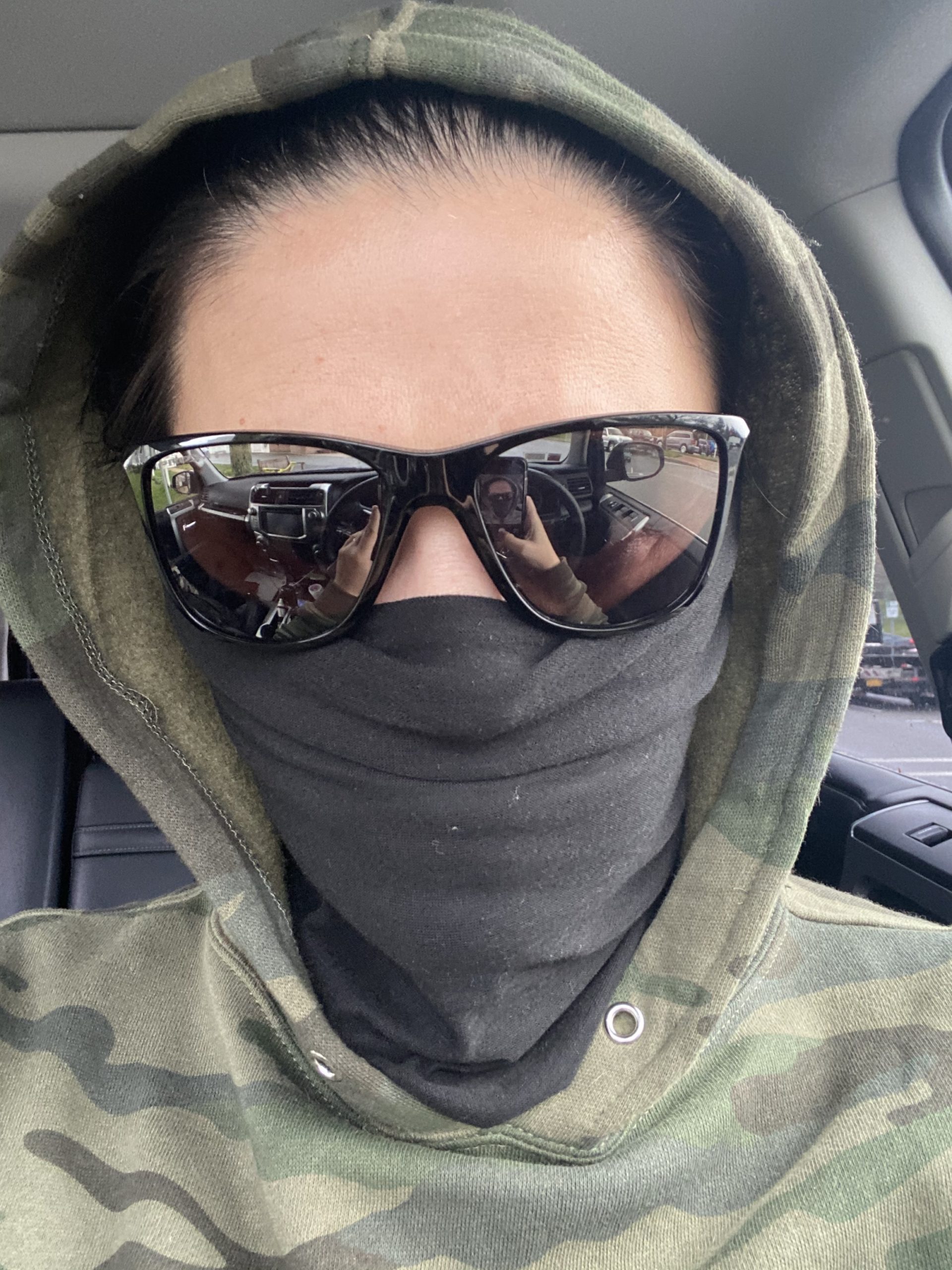 Sara Mannino Kent rocks the camo style with her face covering. 