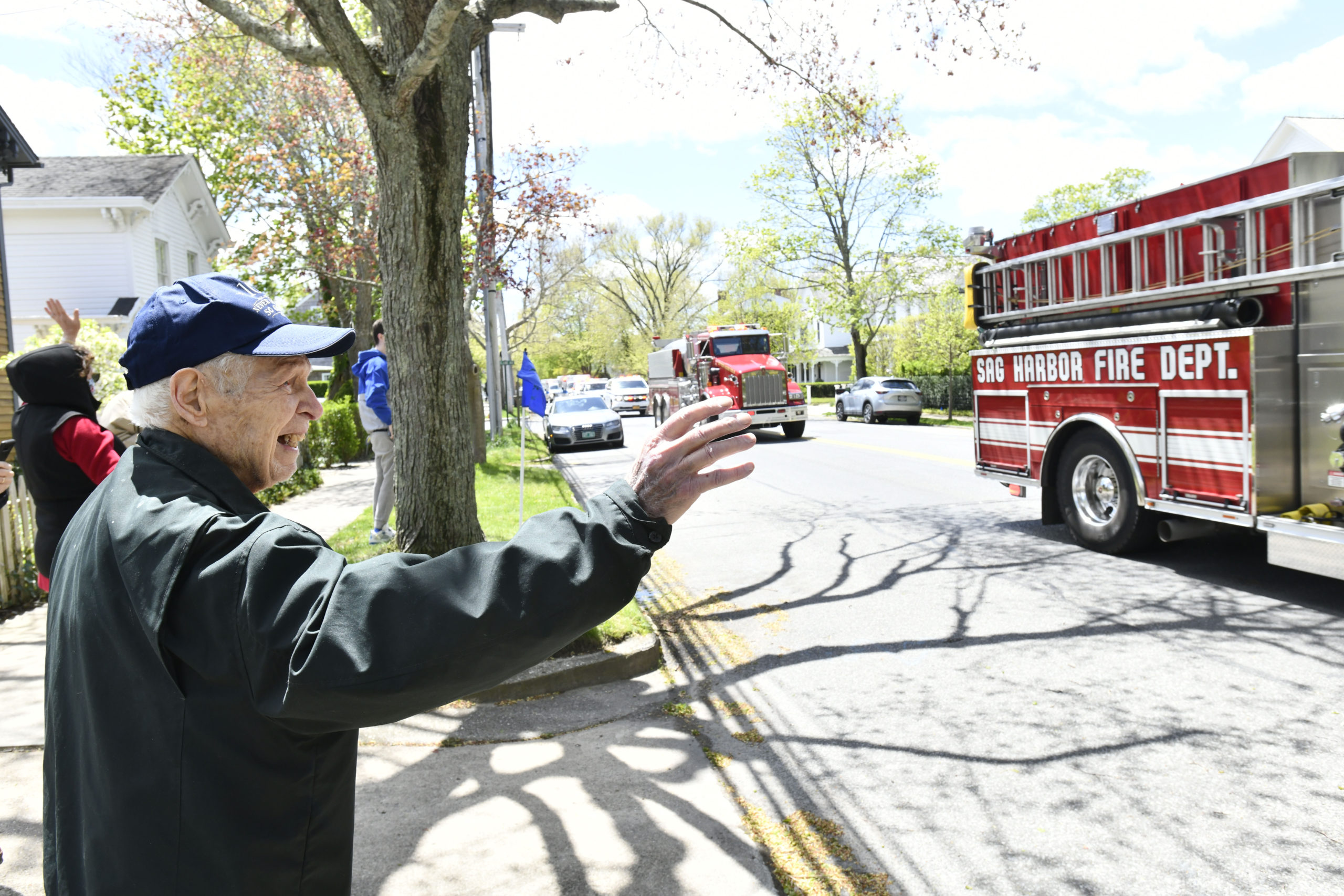 Friends, family and the Sag Harbor Fire Department drove by the home George Boziwick on Saturday to help him celebrate his 100th birthday on May 12.