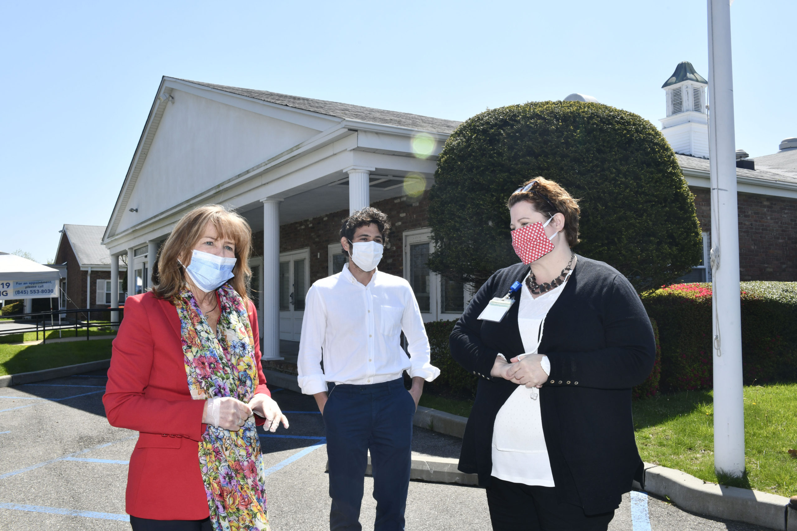 Anne Kauffman Nolon, CEO of HRHCare, Southampton Village Mayor Jesse Warren and Allison Dubois, MPH Chief Operating Officer and Executive Vice President of HRHCare at the Southampton tersting site on Thursday, May 7.  DANA SHAW