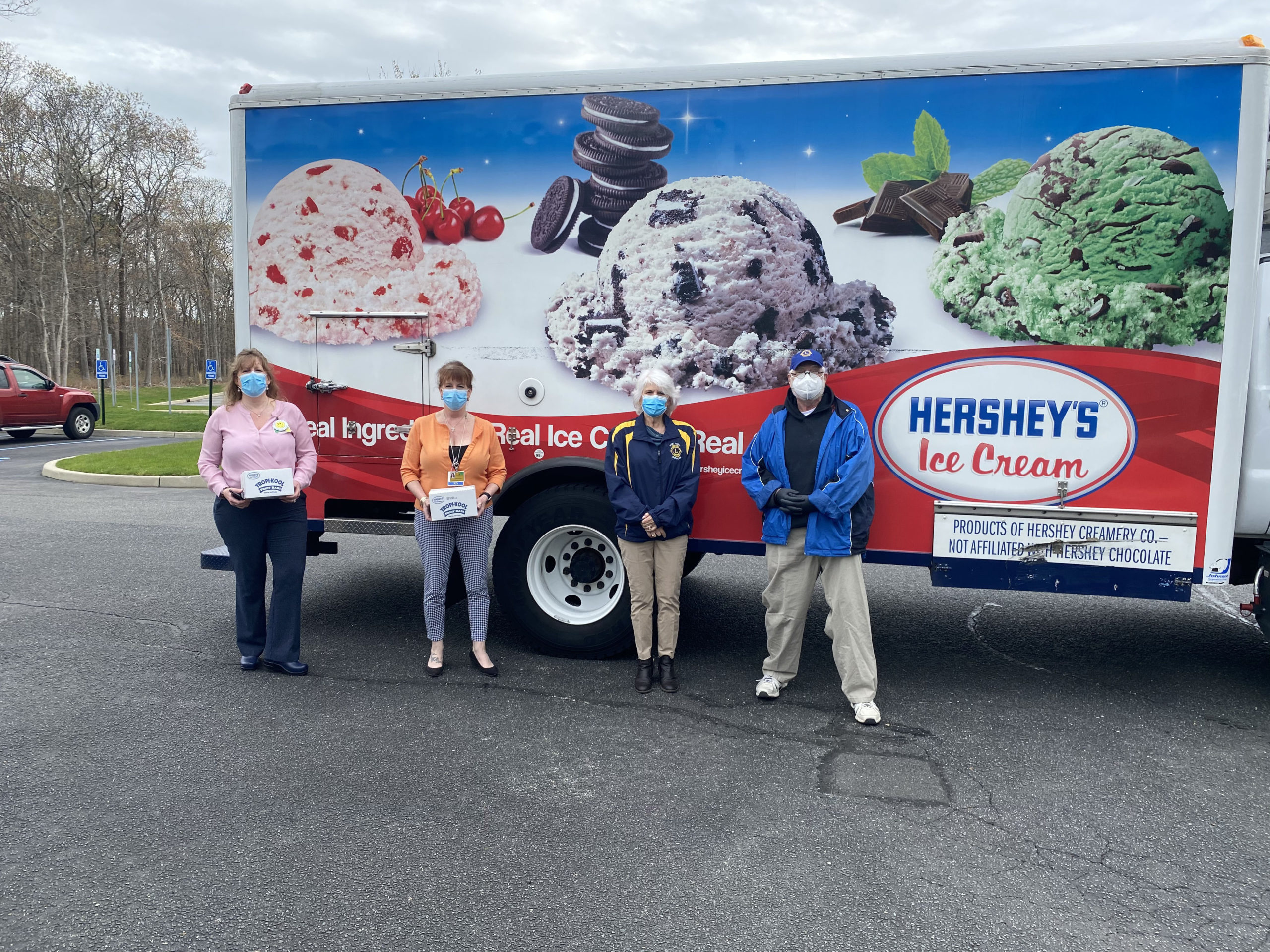 After receiving a grant from Lions International, which has donated over 3,000,000 towards Covid relief, the Lions Clubs of Long Island  distributed ice cream treats to most of the hospitals in Nassau and Suffolk counties. Realizing that nursing home staff are also on the front lines in this crisis, 500 treats were delivered to the Westhampton Care Center last week to show support and to say thank you. Left to right, Kelly Brady, facility administrator; Valleri Barba, director of nursing Judi Perez, president Southold Lions Club and Steve Espach, district governor elect and member, Sag Harbor Lions Club.