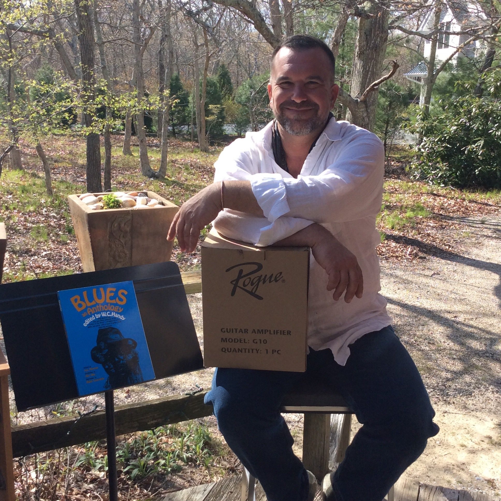 Lyle Granger at his home in Sag Harbor with the first donations for Operation Beat the Blues.