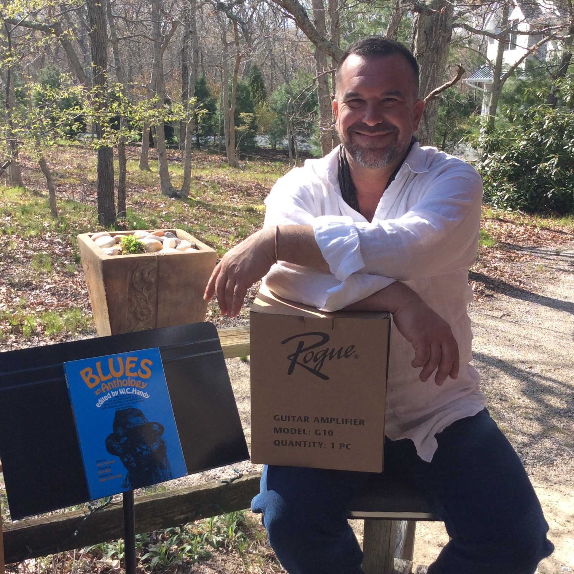 Lyle Granger with the first donations for Operation Beat the Blues.