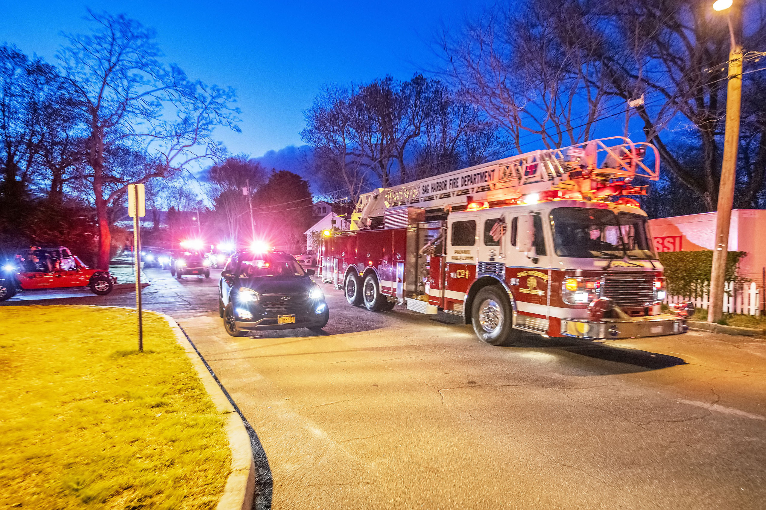 The Sag Harbor Fire Department made a surprise appearance during a parade in tribute to the Pierson High School senior athletes in the Montauk Avenue parking lot behind the school on Friday night.