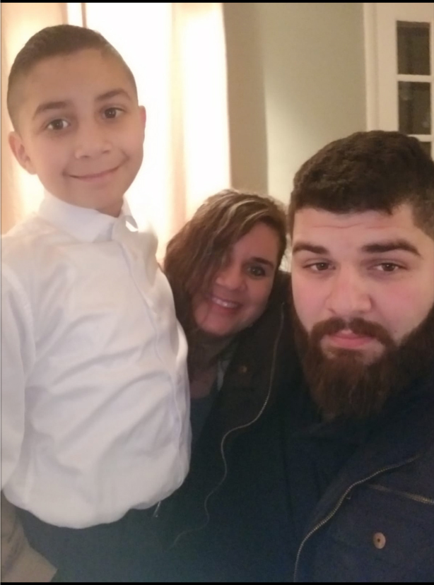 Brandon Soto and his mother, Elena Araya Mora, and Brandon's little brother.