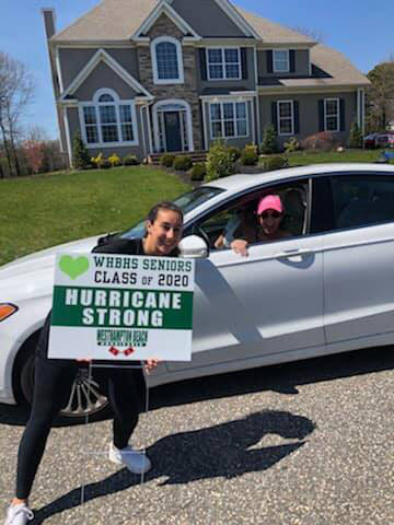 Parents and seniors teamed up on April 25 to pay tribute to the Westhampton Beach High School Class of 2020 by delivering 224 green and white graduation lawn signs bearing the words “Hurricane Strong.”    COURTESY WESTHAMPTON BEACH SCHOOL DISTRICT