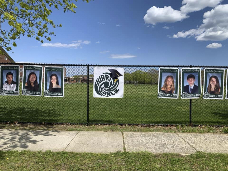 The Westhampton Beach High School Class of 2020 is being recognized with giant posters that adorn the fence along Mill Road in Westhampton Beach.  COURTESY WESTHAMPTON BEACH SCHOOL DISTRICT