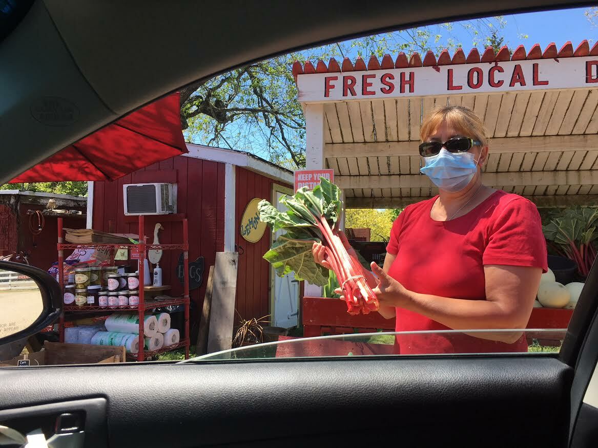 Fresh produce safely through the car window. KITTY MERRILL