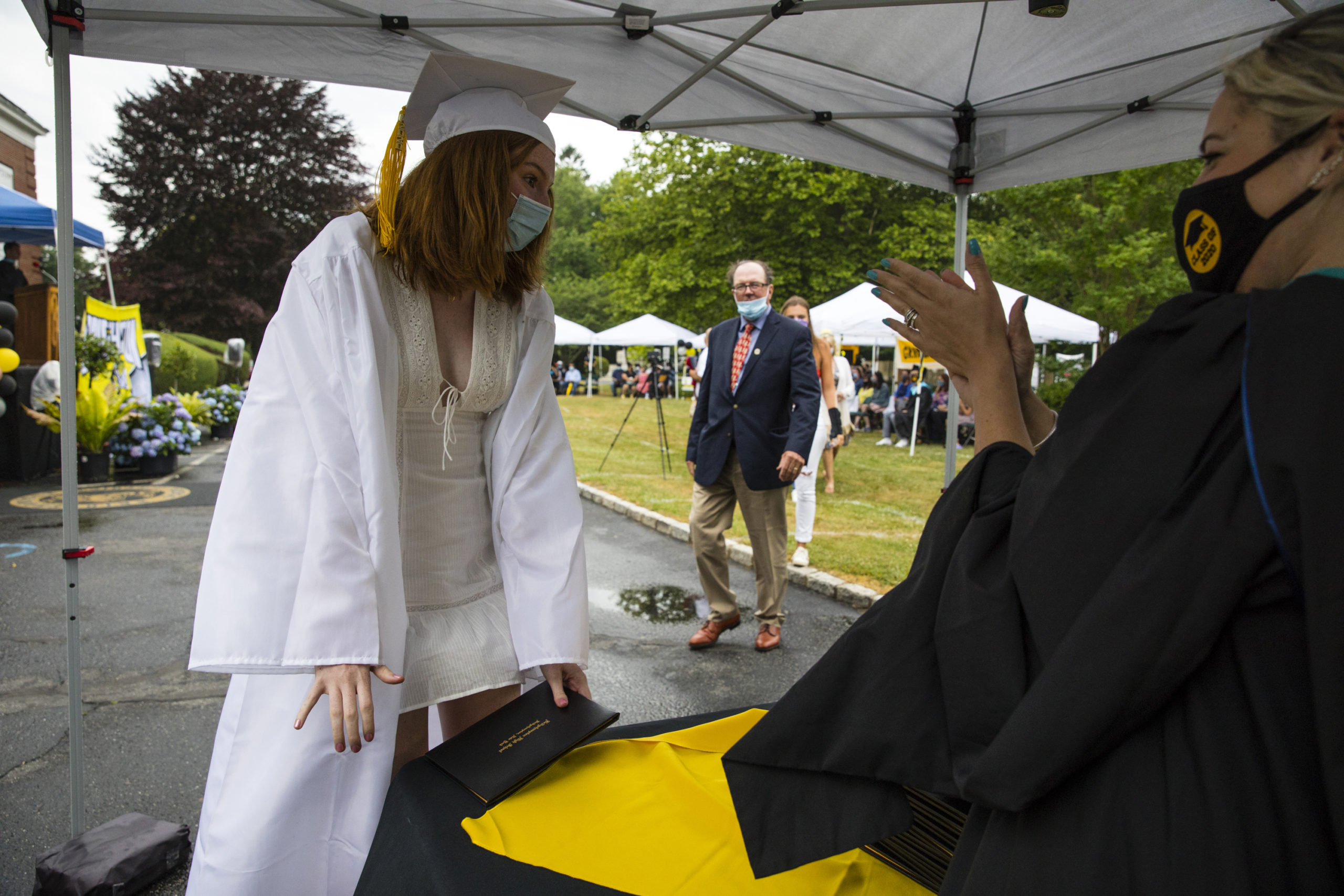 Beatrice DeGroot picks up her diploma at the Bridghampton School graduation on Saturday.  
