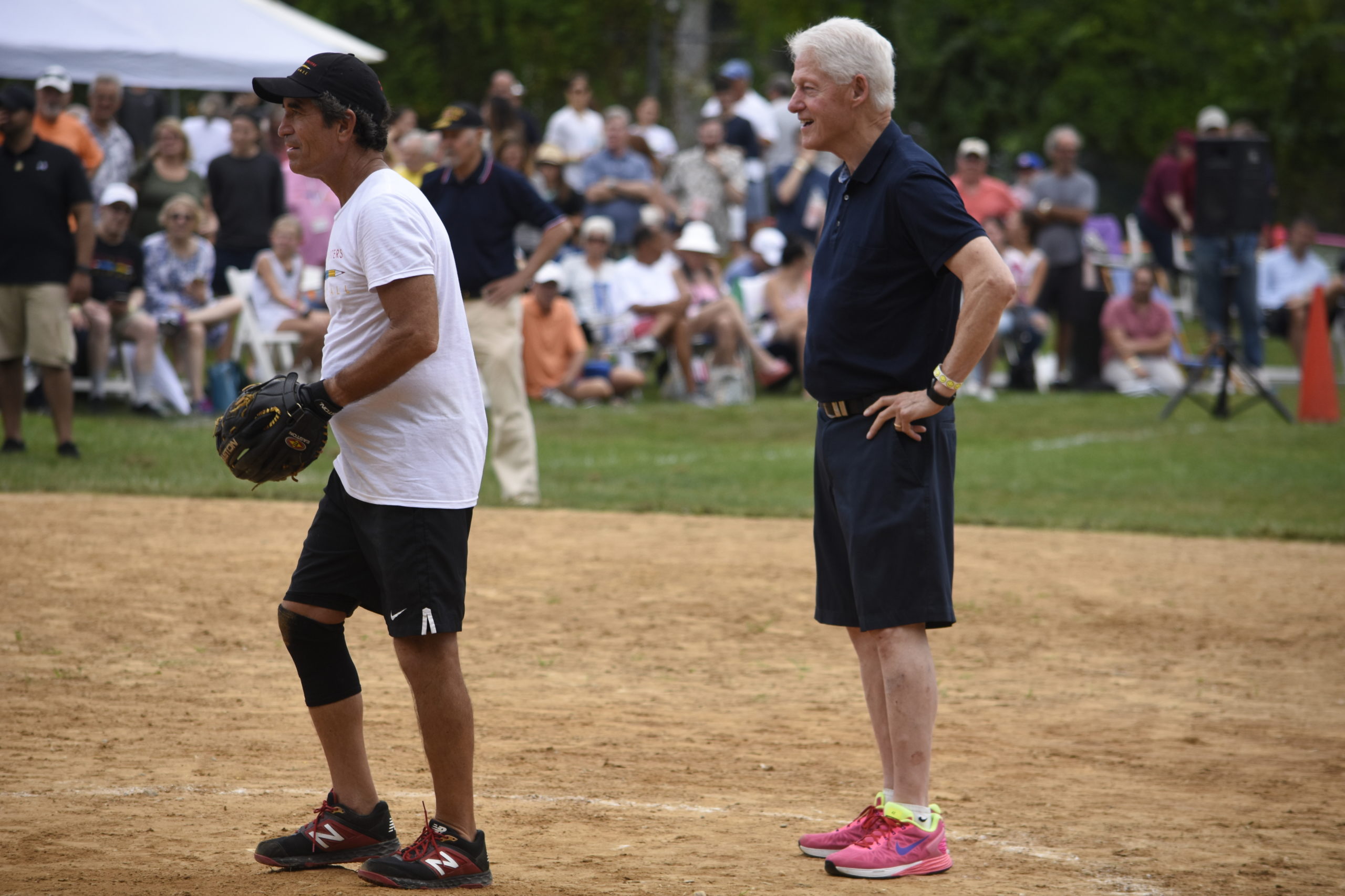 Former President Bill Clinton called balls and strikes for the first few innings of last year's Artists and Writers Charity Softball Game.  PRESS FILE