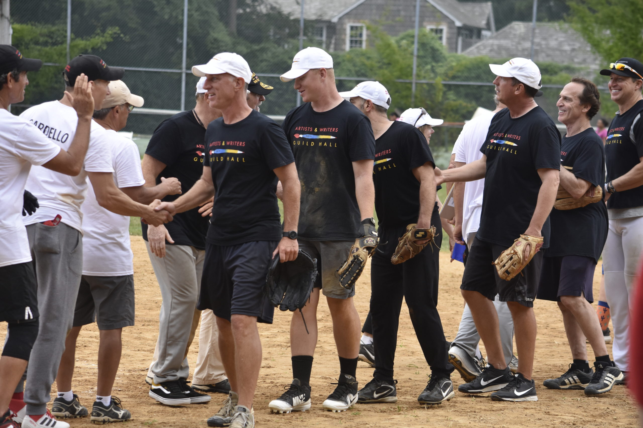 President Clinton called balls and strikes for the first few innings of last year's Artists and Writers Charity Softball Game.  PRESS FILE