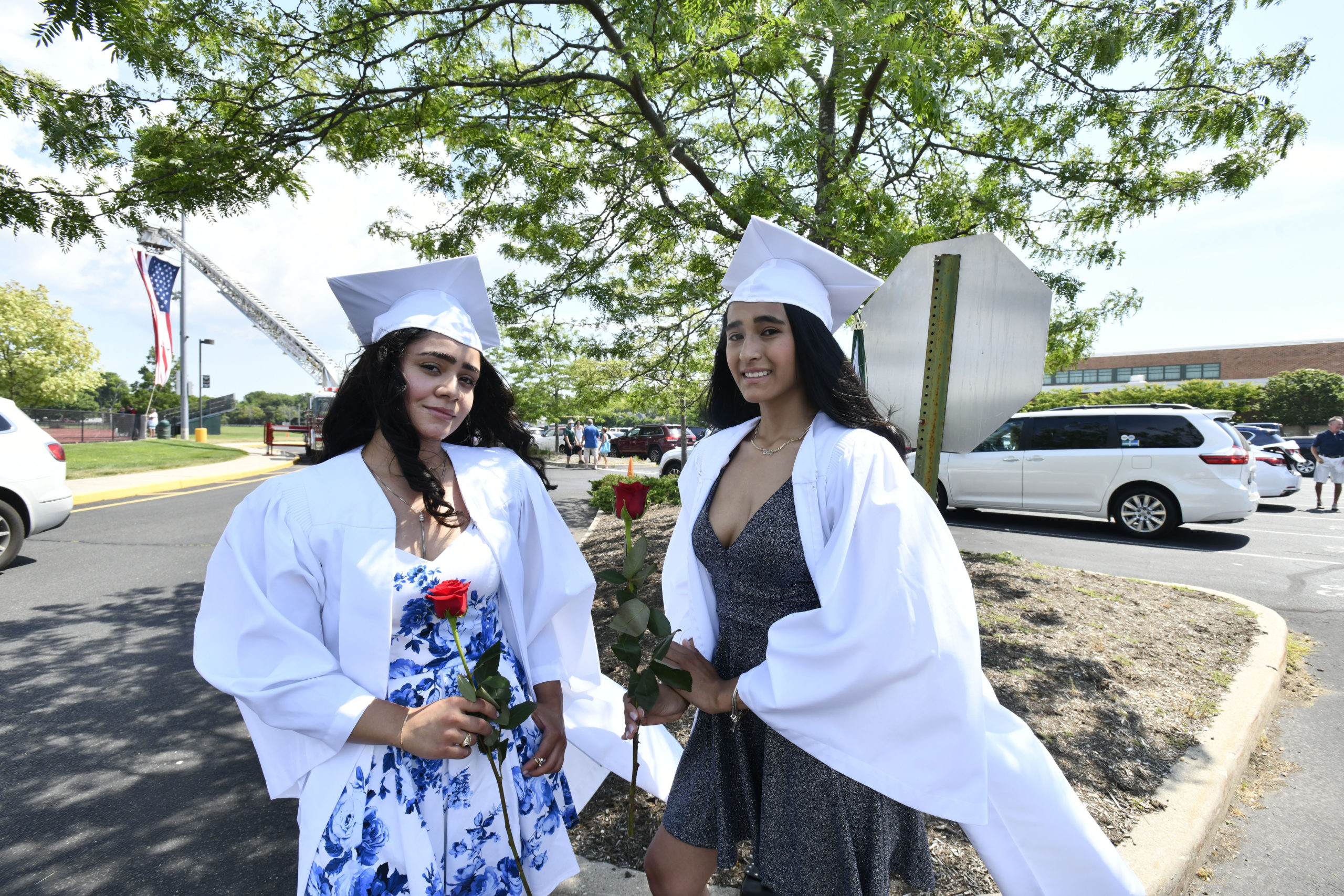 Graduates Rosa Cobarrubia and Emily Caballero.