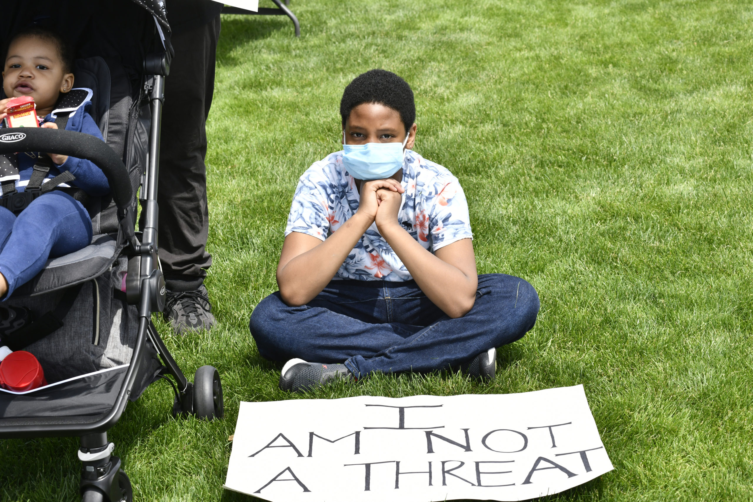 Kaiden Davis, 10, of Southampton at the vigil in Agawam Park on Thursday.  DANA SHAW