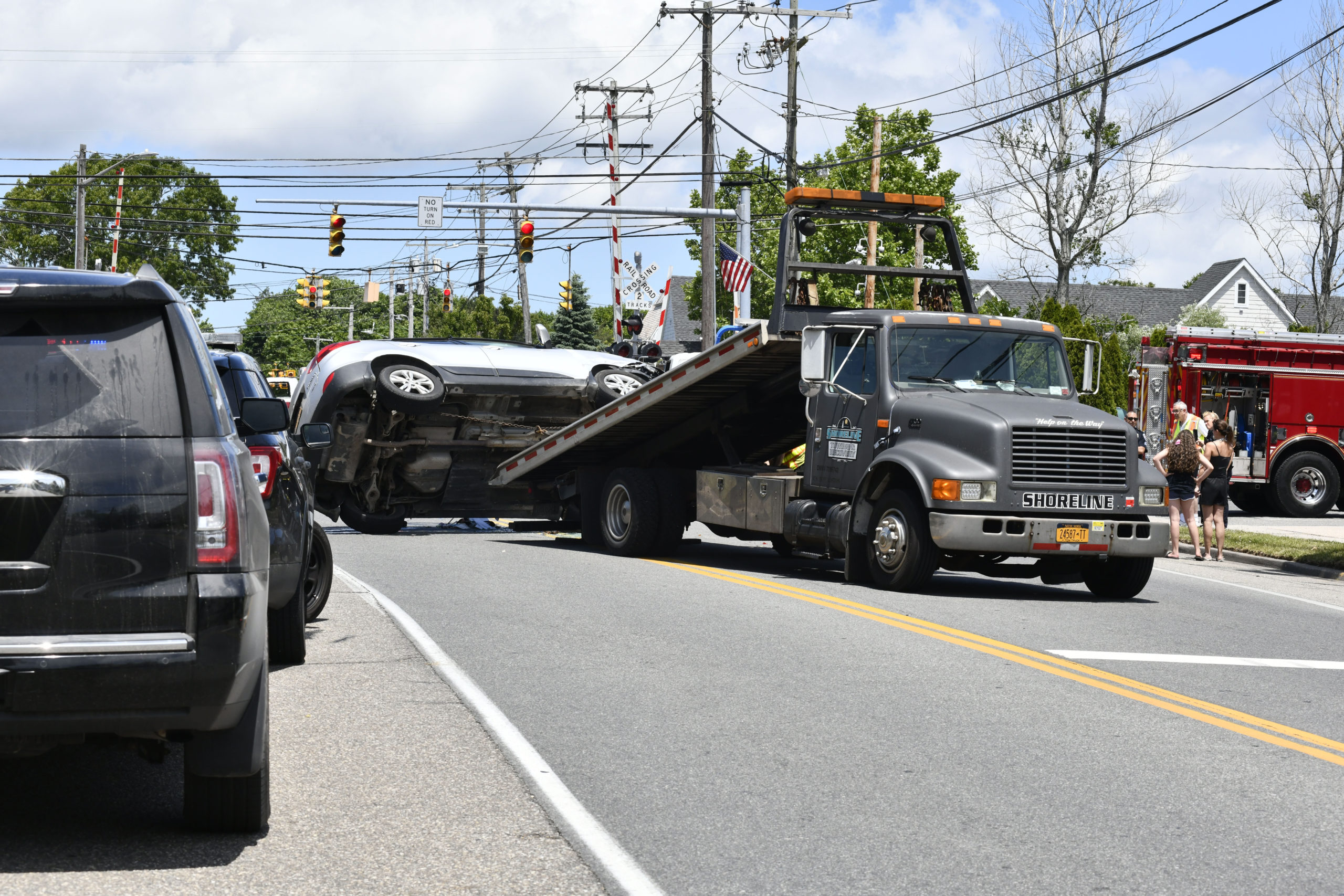An accident with a rollover occured on Ponquogue Avenue near Good Ground Road on Sunday at about noon.  DANA SHAW