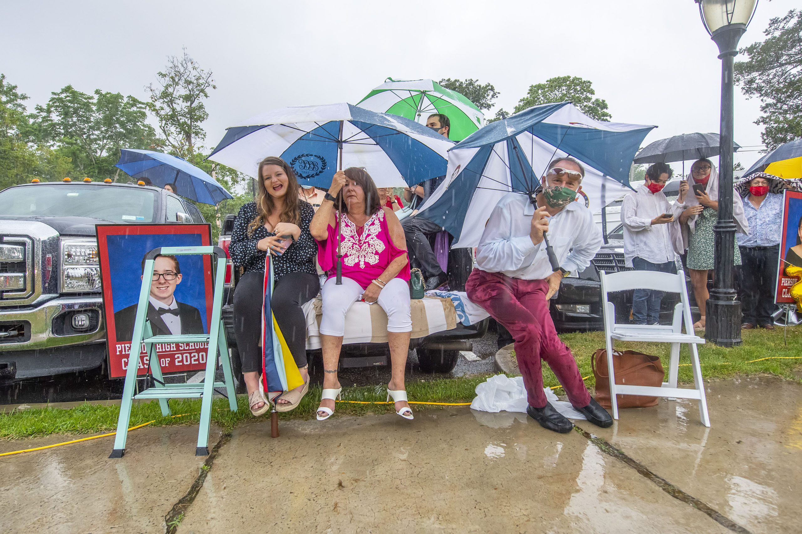 The Kruel family cheered on Dylan Kruel in spite of a downpour during the Pierson High School 2020 Commencement Ceremony at Pierson High School on Saturday.