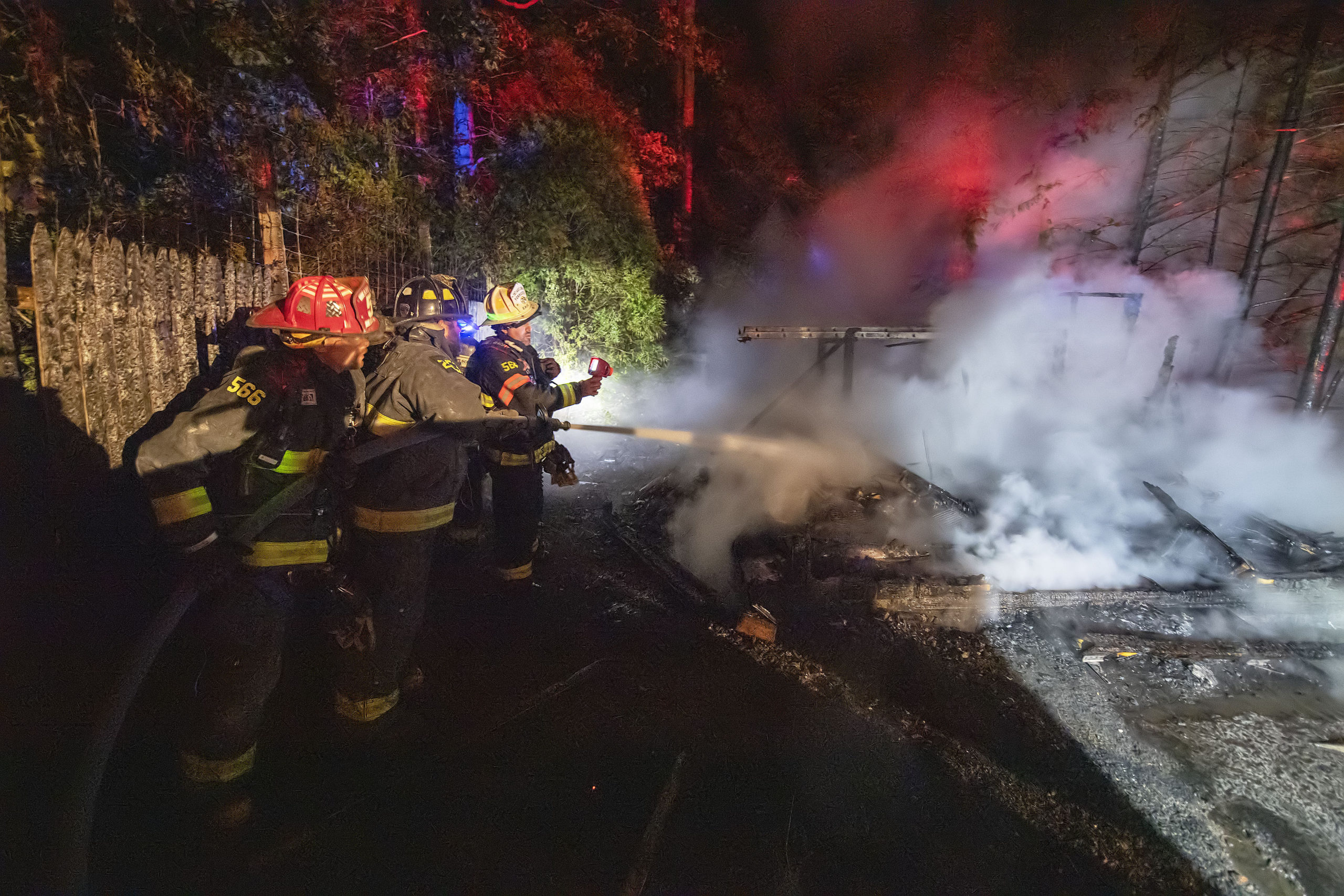 East Hampton firefighters were called out to extinguish a fire that destroyd a shed on Cove Hollow Road in East Hampton late June 17. MICHAEL HELLER PHOTOS