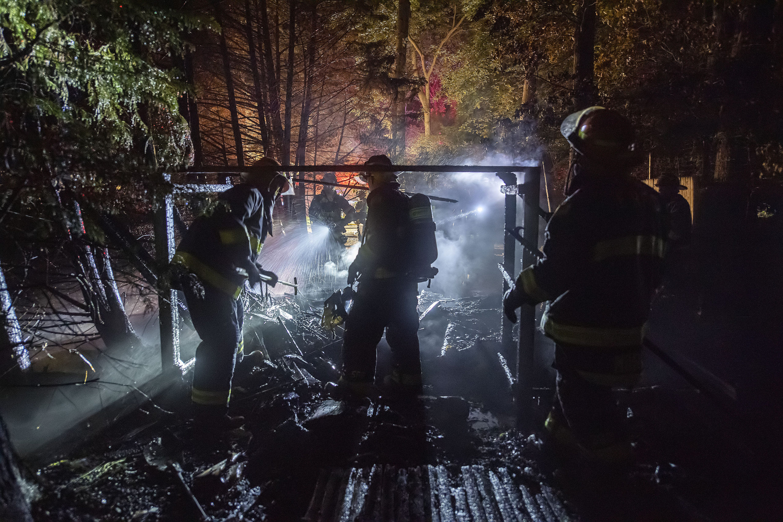 East Hampton firefighters were called out to extinguish a fire that destroyd a shed on Cove Hollow Road in East Hampton late June 17. MICHAEL HELLER PHOTOS