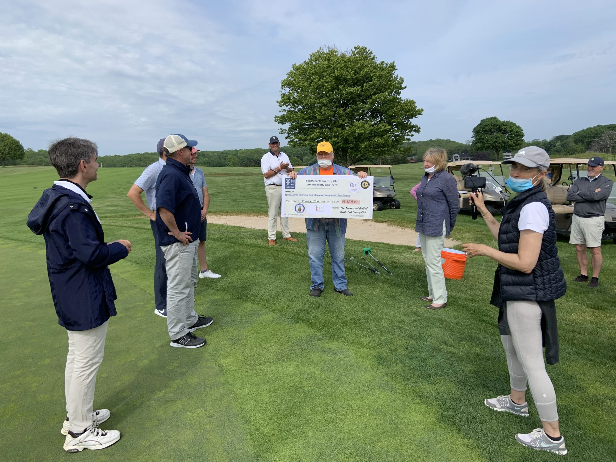 The South Fork Country Club in Amagansett raised over $115,000 for the East Hampton/Amagansett and Springs food pantries in a charity golf match on Friday.  GABRIELA CARROLL