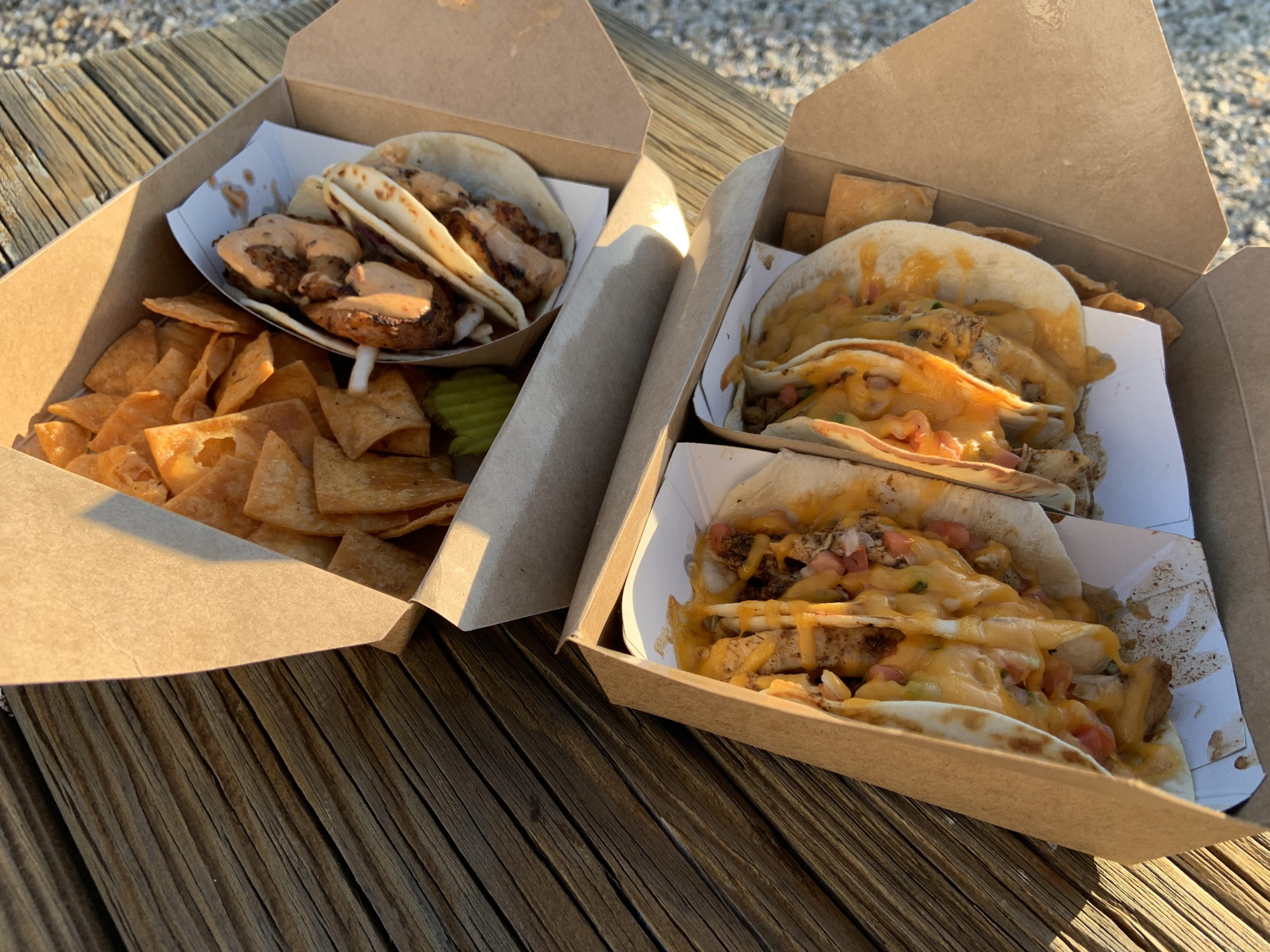 Shuckers shrimp tacos, left, and two orders of chicken tacos, right.