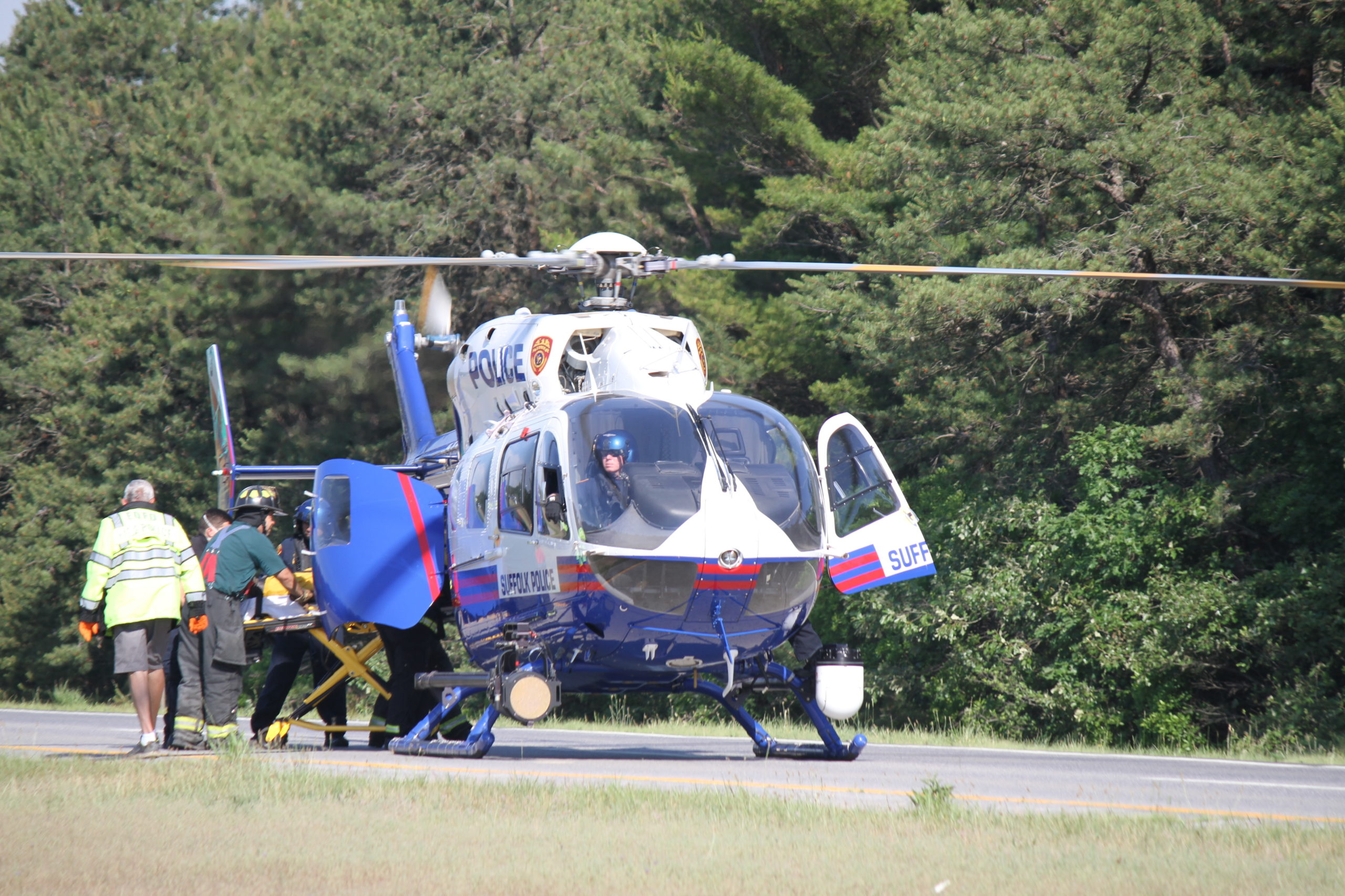 A Medevac helicopter landed on the westbound lanes of Sunrise Highway on Friday morning to transport a man who was seriously injured when his car flipped over. 