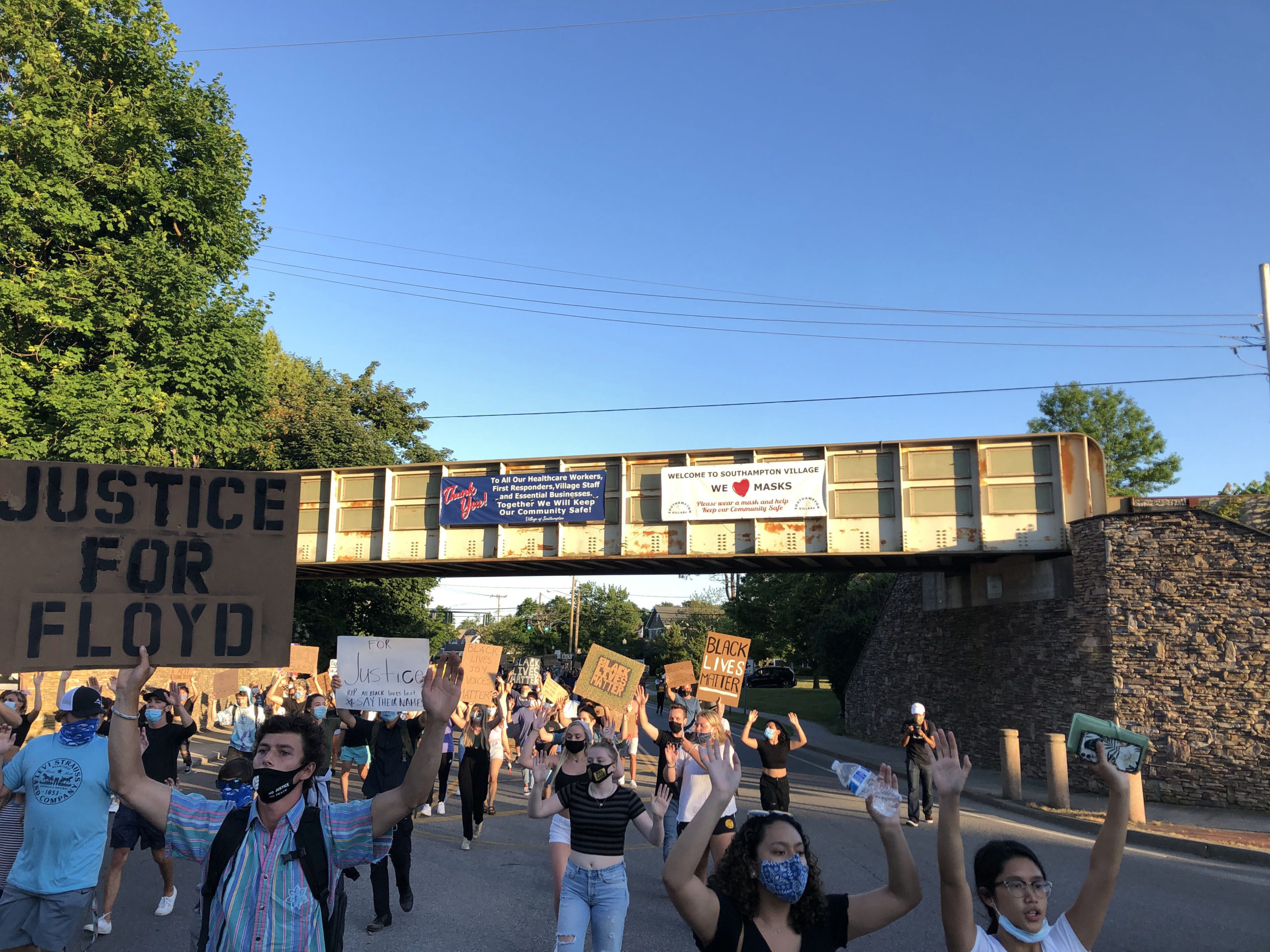 Demonstrators marched through the streets of Southampton Village Friday night in support of racial equality.  ALEC GIUFURTA