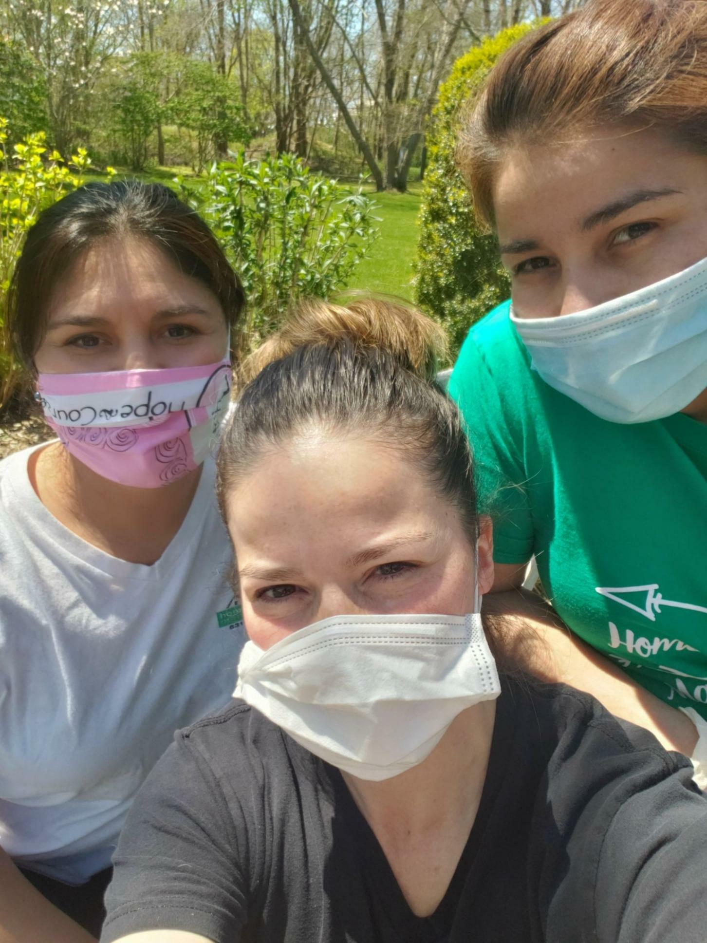 From left, Maria, Eliane and Blanka of C's Home & Office Management sport masks.