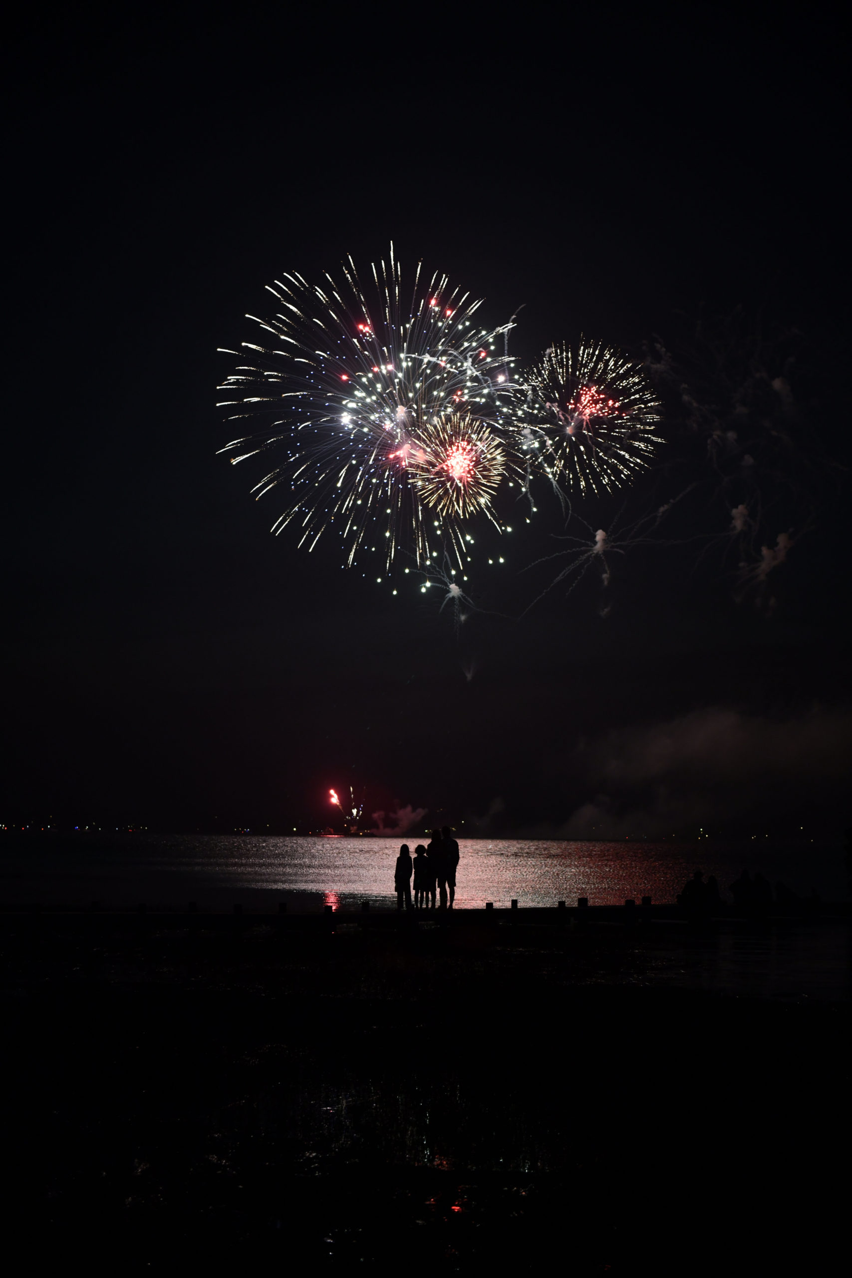 The Southampton Fresh Air Home fireworks on Shinnecock Bay on Sunday night.  DANA SHAW