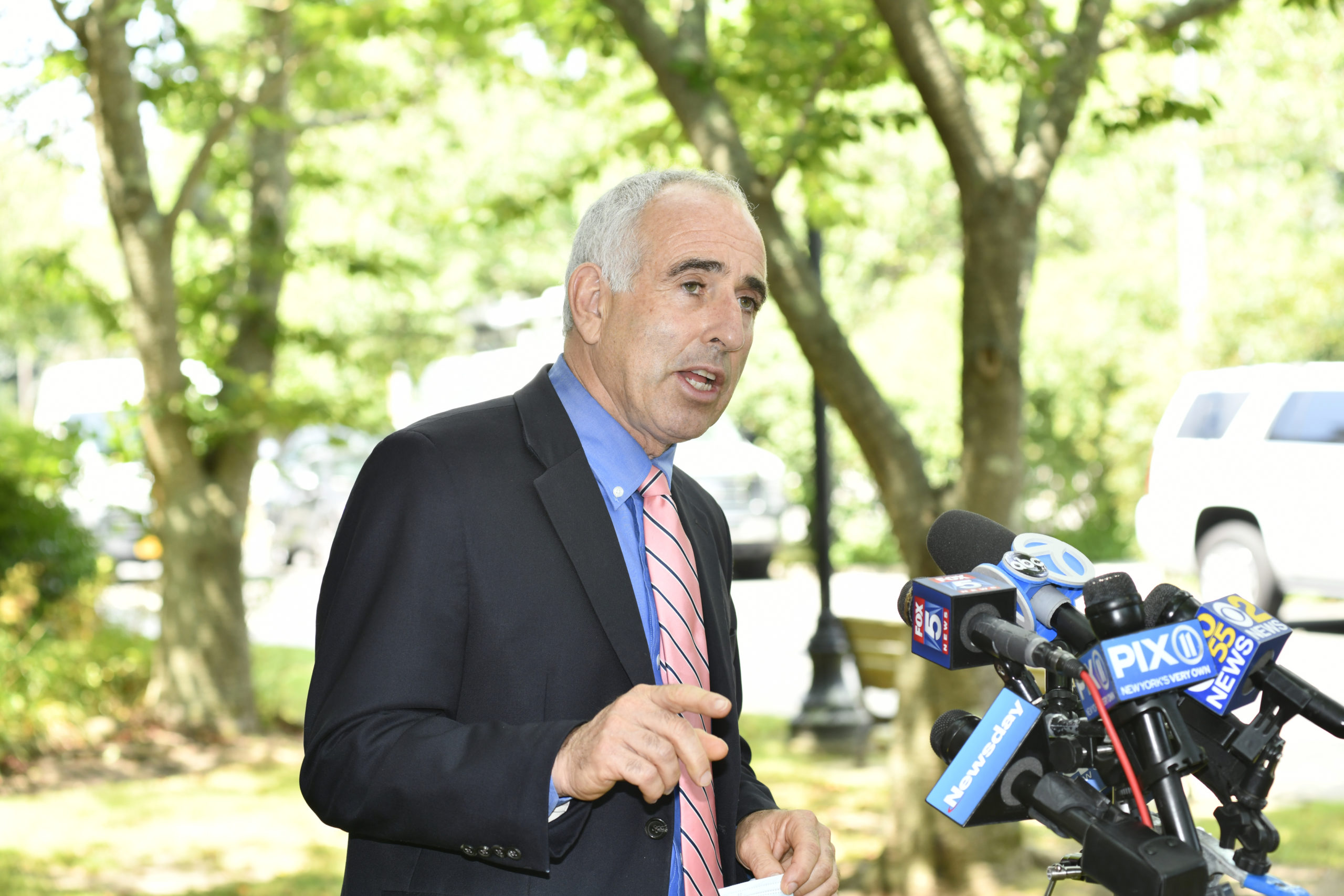 Southampton Town Supervisor Jay Schneiderman holds a press conference outside of town hall on Tuesday afternoon regarding the concert in Water Mill on Saturday night.   DANA SHAW