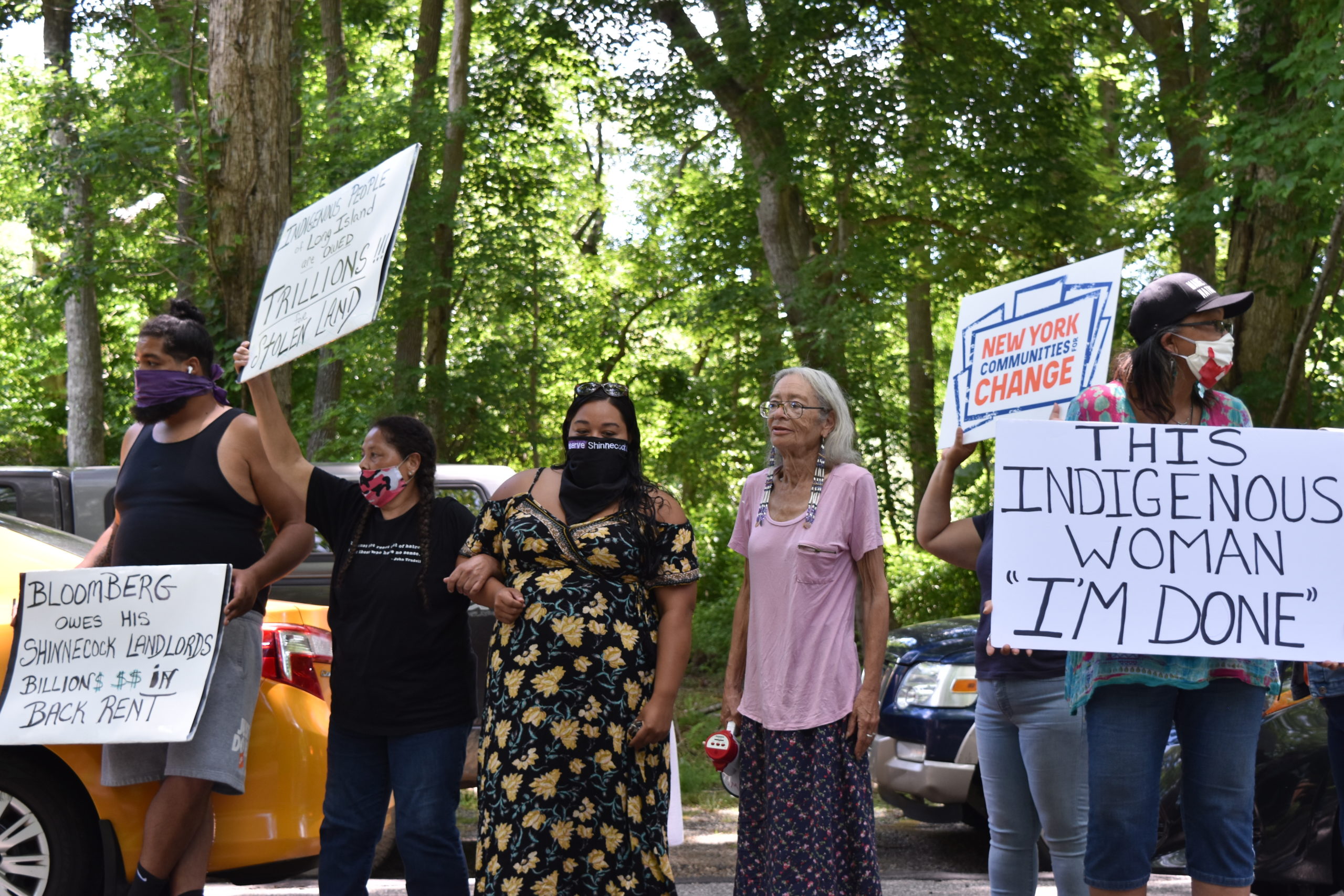 A protest caravan descened on the homes of East End billionaires, incluing the home of former New York City Mayor Michael Bloomberg, Wednesday with demonstrators demanding that Gov. Andrew Cuomo implement a wealth tax. 