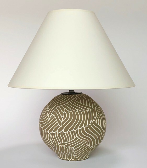 • Ceramic stoneware table lamp with spherical form on foot, white hand-carved feather drawing into a khaki background underglaze. Donated by David Netto.