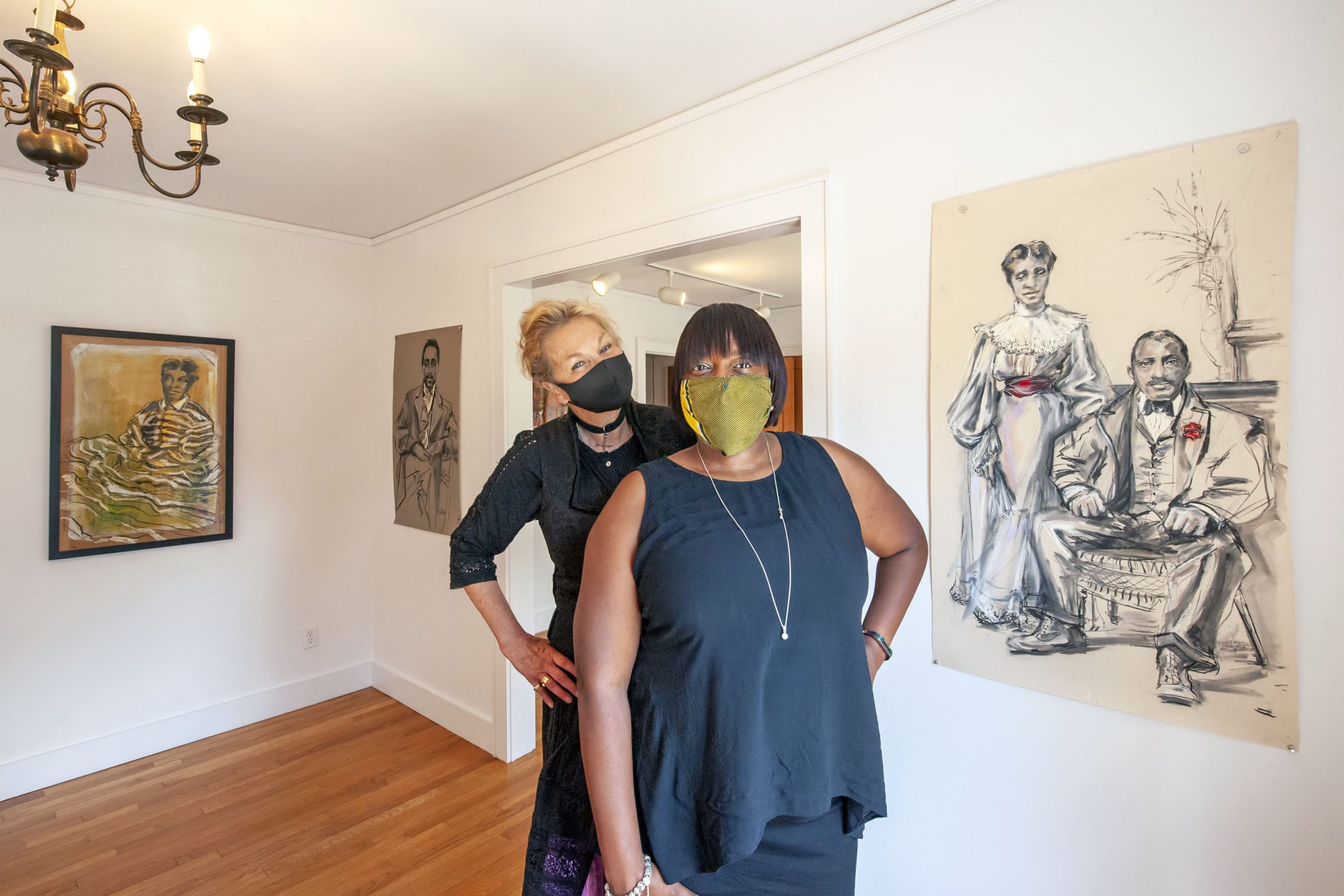 Artist Sabina Streeter with Eastville Historical Society's Dr. Georgette Grier just prior to the opening of Streeter's exhibition at the Society's Heritage House on Saturday. MICHAEL HELLER