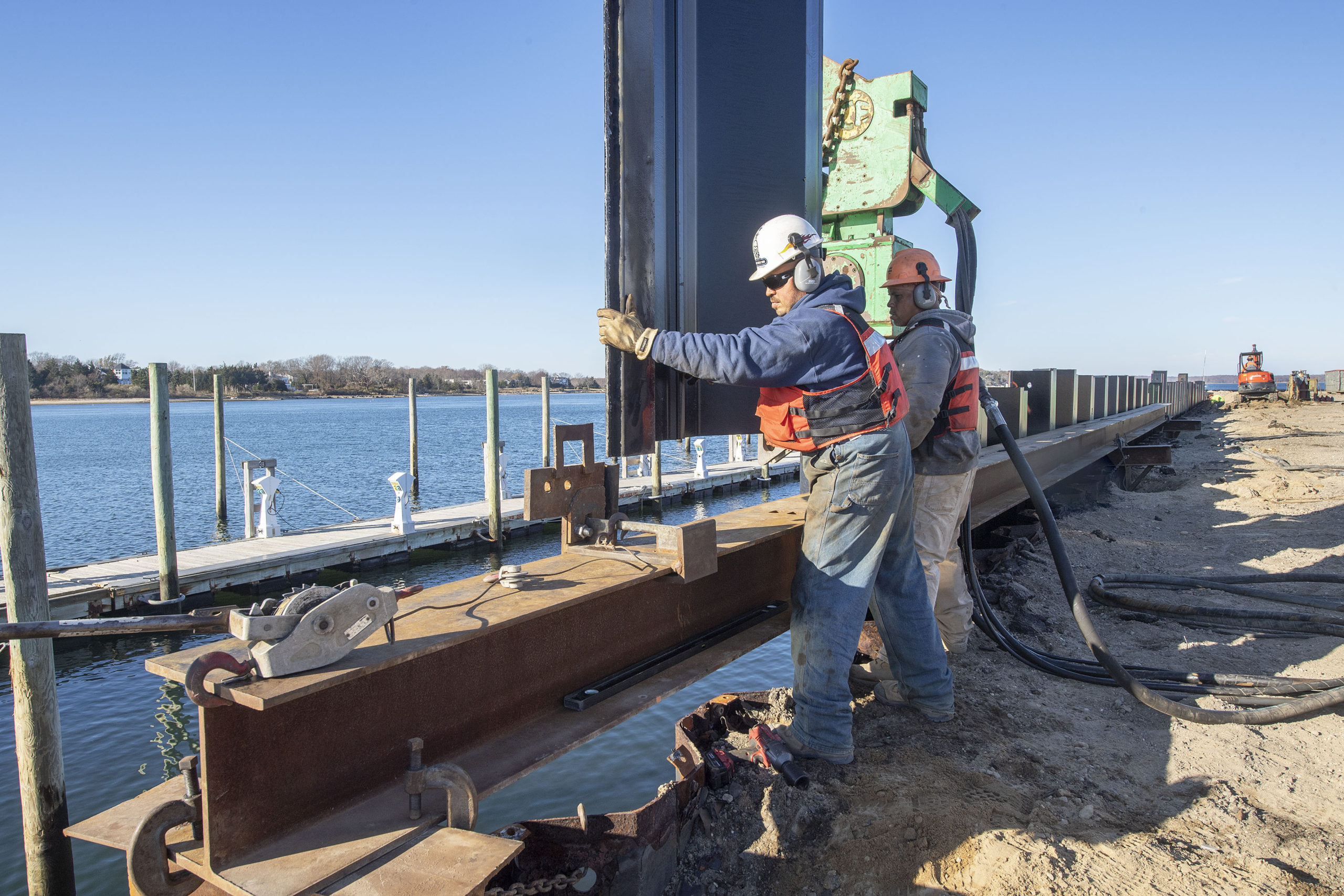 Workers installed new sheathing around Long Wharf in Sag Haror as part of a major restoration project that is almost complete. MICHAEL HELLER
