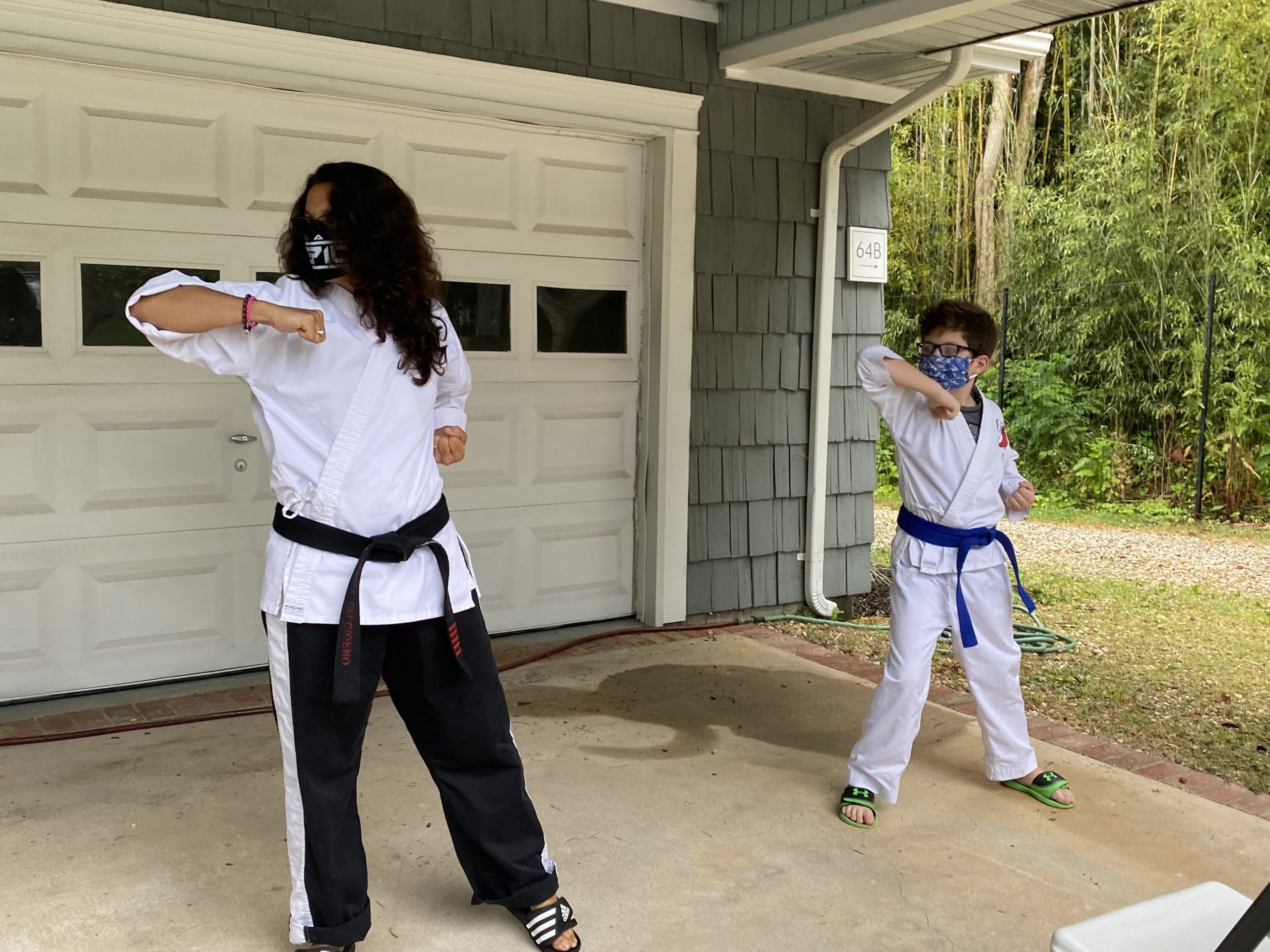 Michelle Del Giorno teaching a private martial arts lesson to student Wilson Lones at his home on Shelter Island