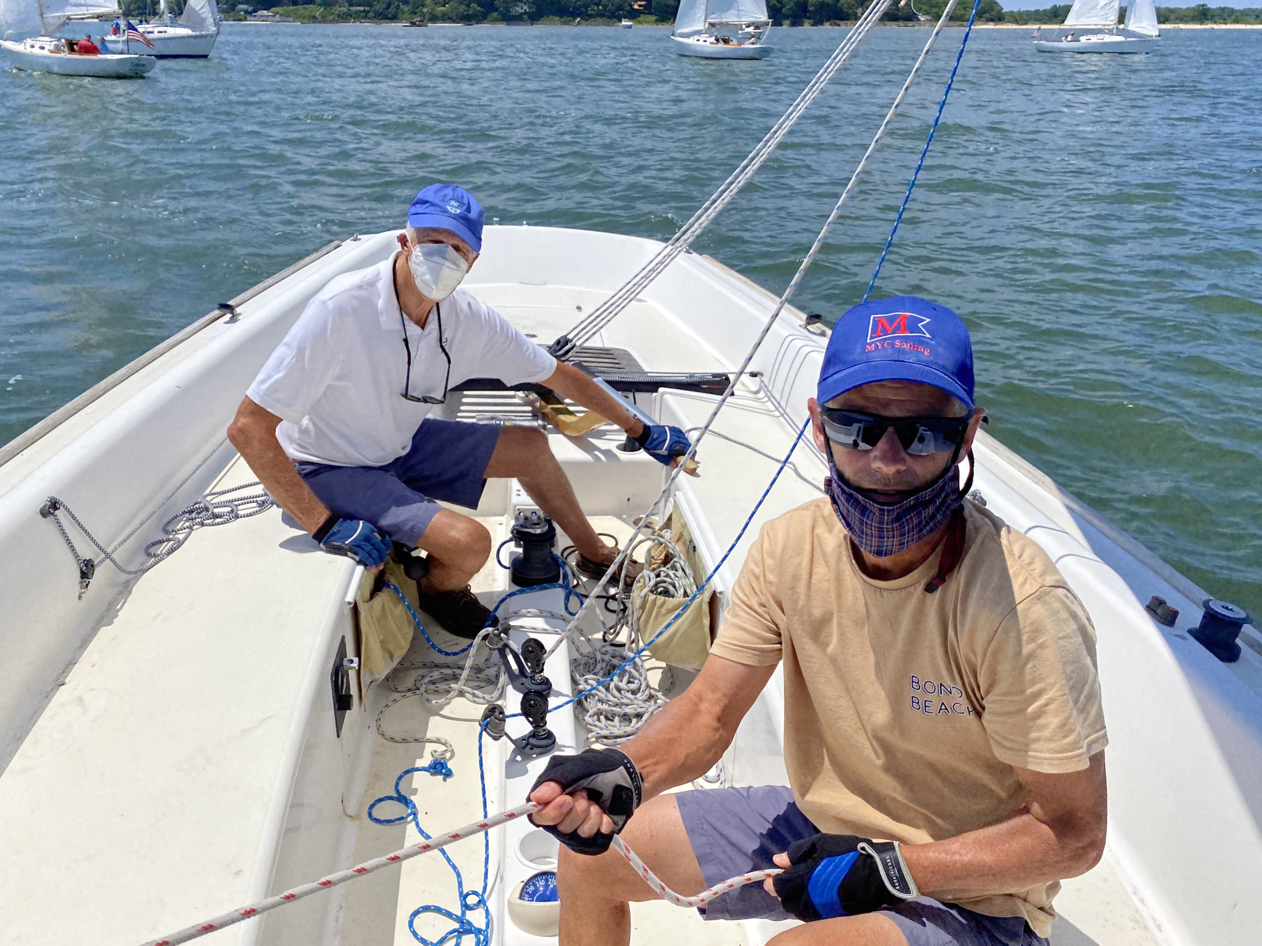 Captain Mark Rickabaugh and jib sheet trimmer Bill Edwards aboard the e-33 yacht, Entropy during the Peconic Bay Sailing Association race on Saturday hosted by the New Suffolk Old Cove Yacht Club.     MICHAEL MELLA