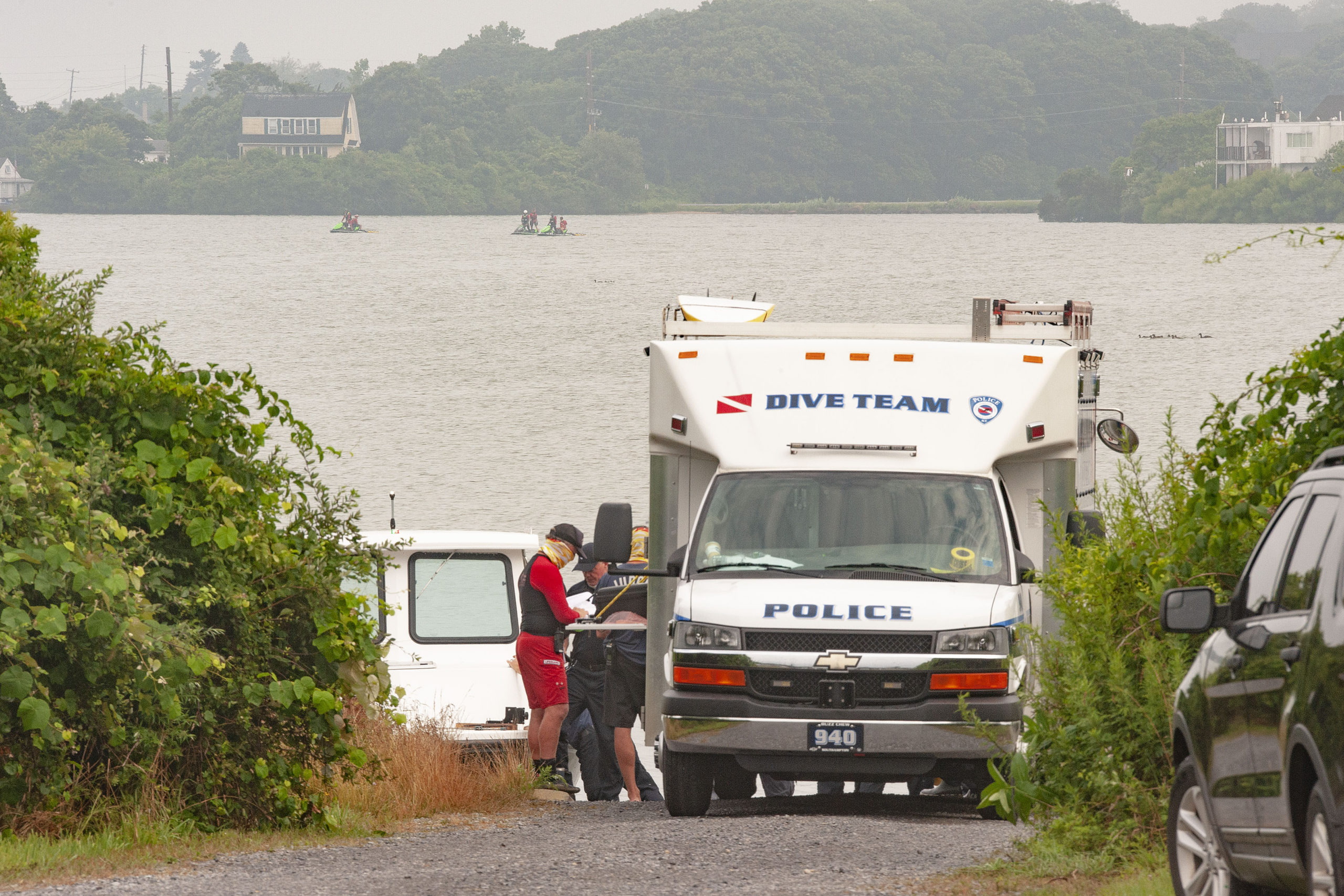 Dive teams and lifeguards resumed searching for the missing swimmer on Monday morning. 