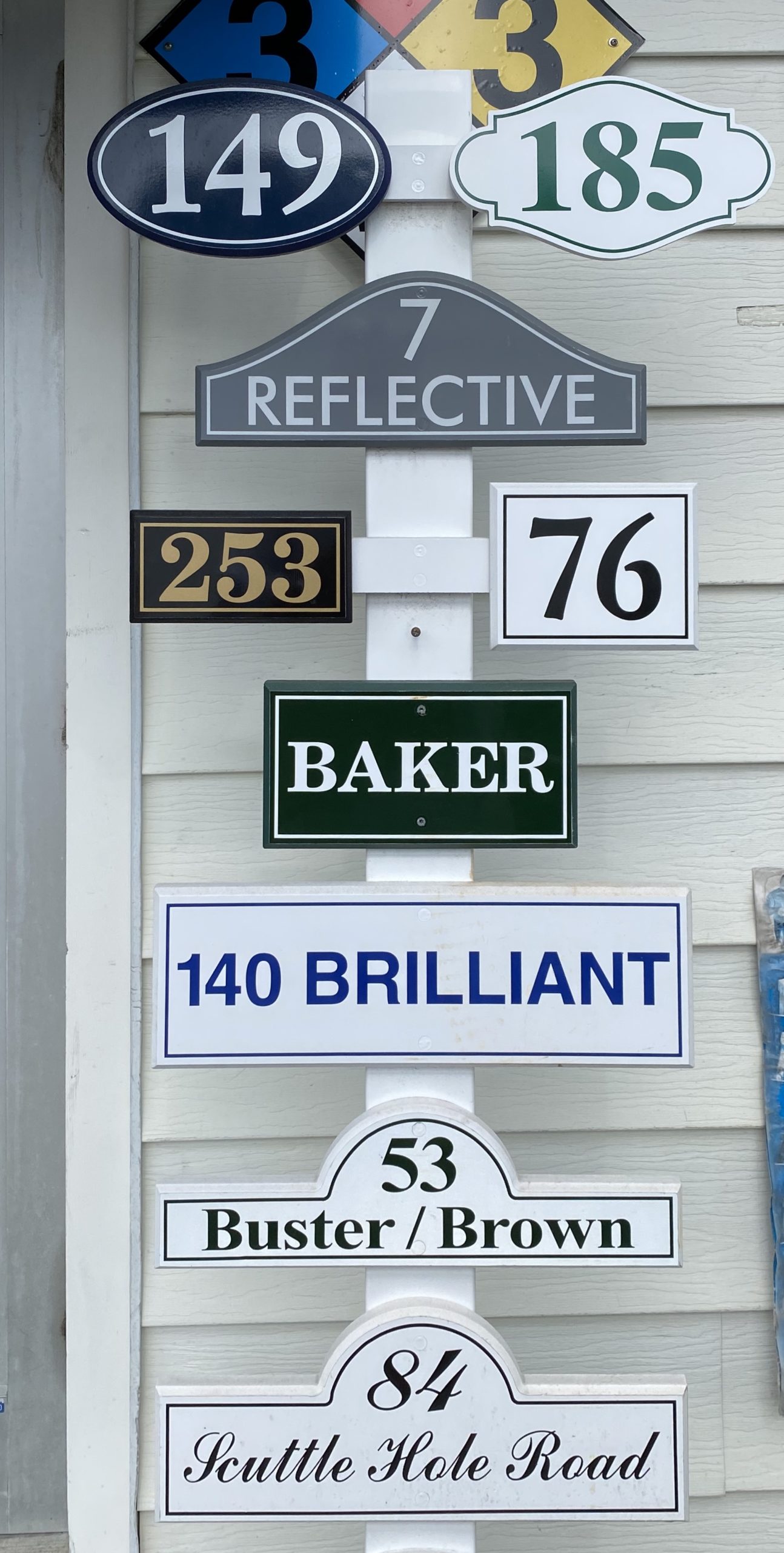 Display of sign styles available at Herrick Hardware on Main Street in Southampton Village.