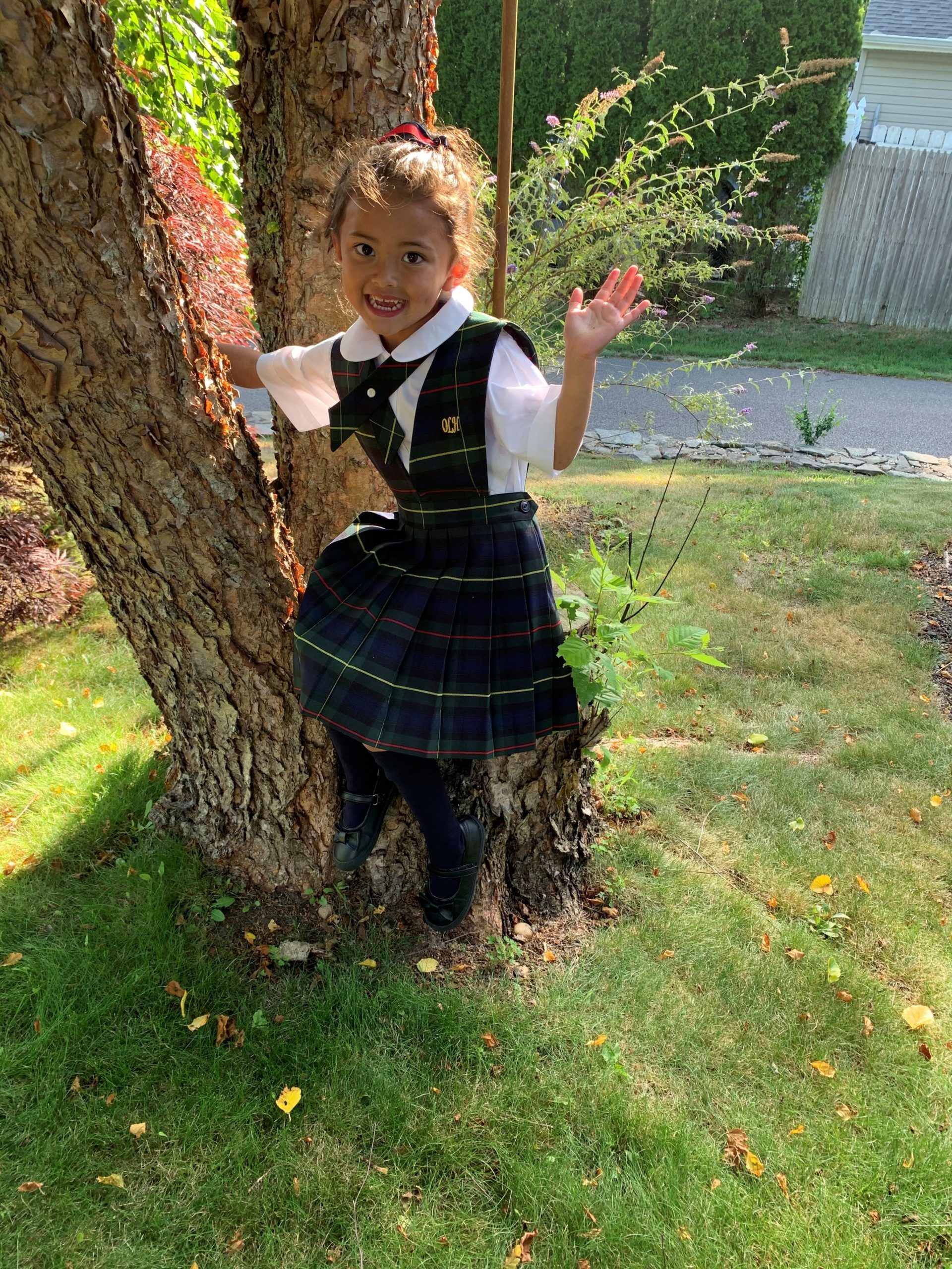New kindergartner Myla Turnbull tried on her new OLH uniform for the first time.